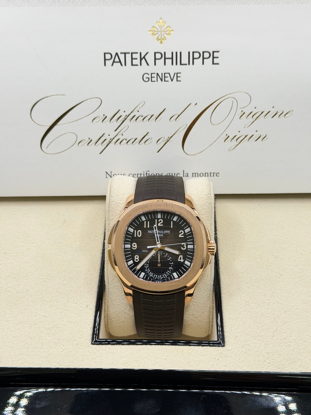 May be an image of wrist watch and text