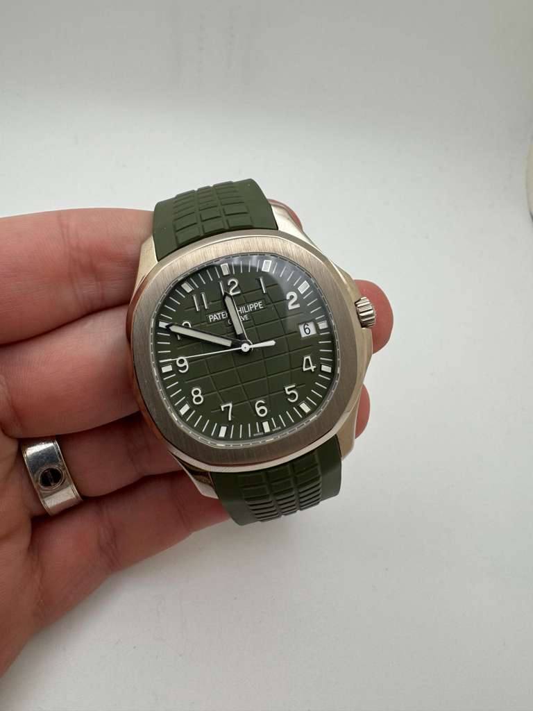 May be an image of digital watch and text that says '12 HILIPPE E PATE 2 า 6 WI و ထ '