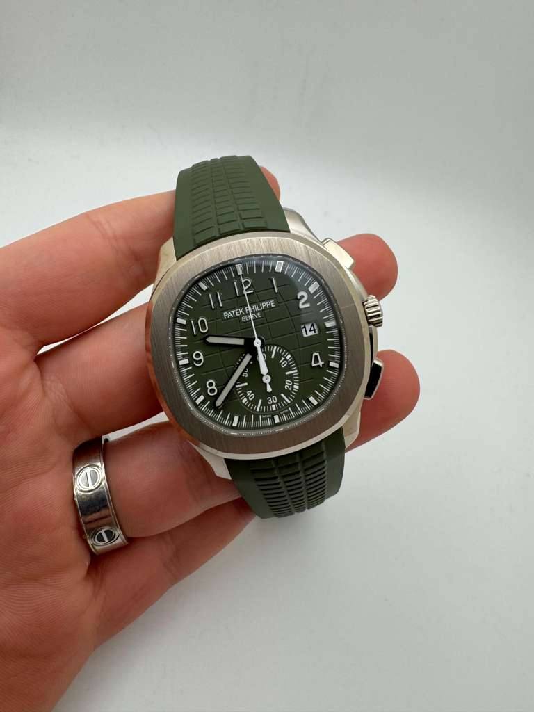 May be an image of wrist watch and text that says '1 T 2 LIPPE PATEK ባ N 2 A 1 30 د'