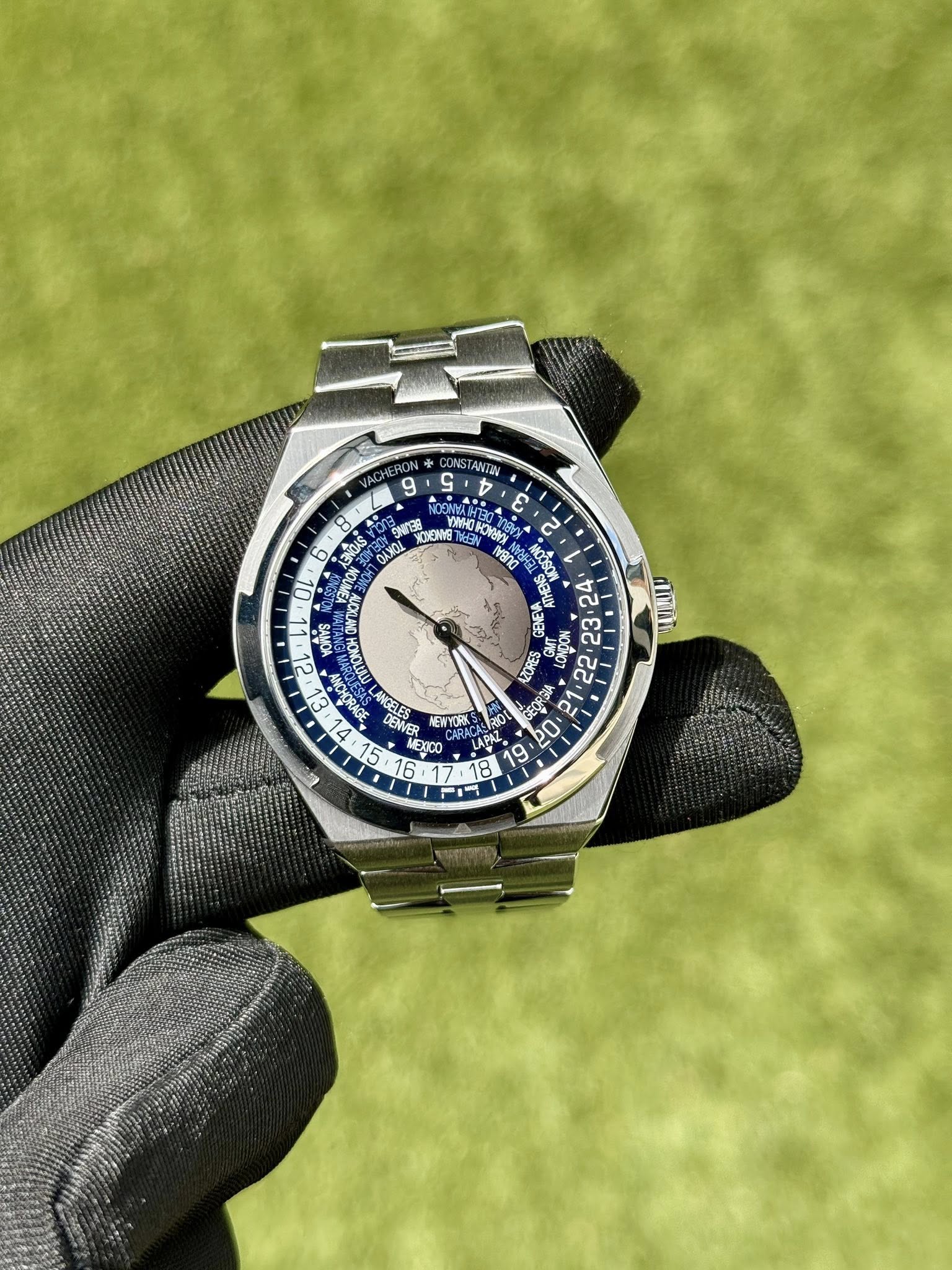 May be an image of wrist watch and text