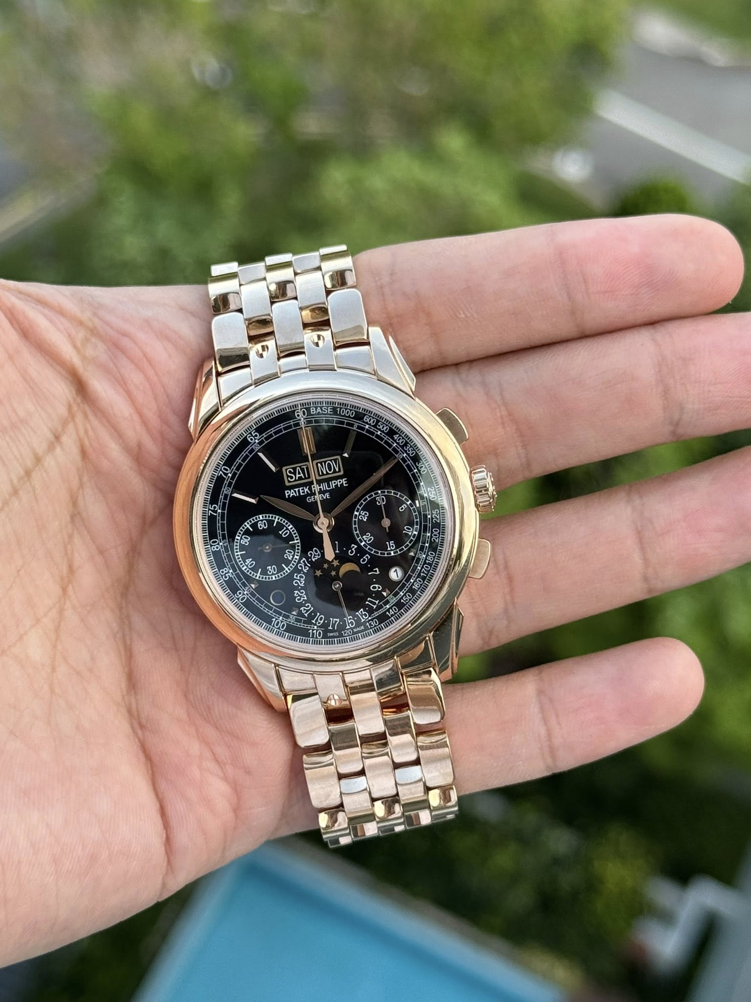 May be an image of wrist watch and text that says 'BASE SA PATEK HILIPPE NOV'