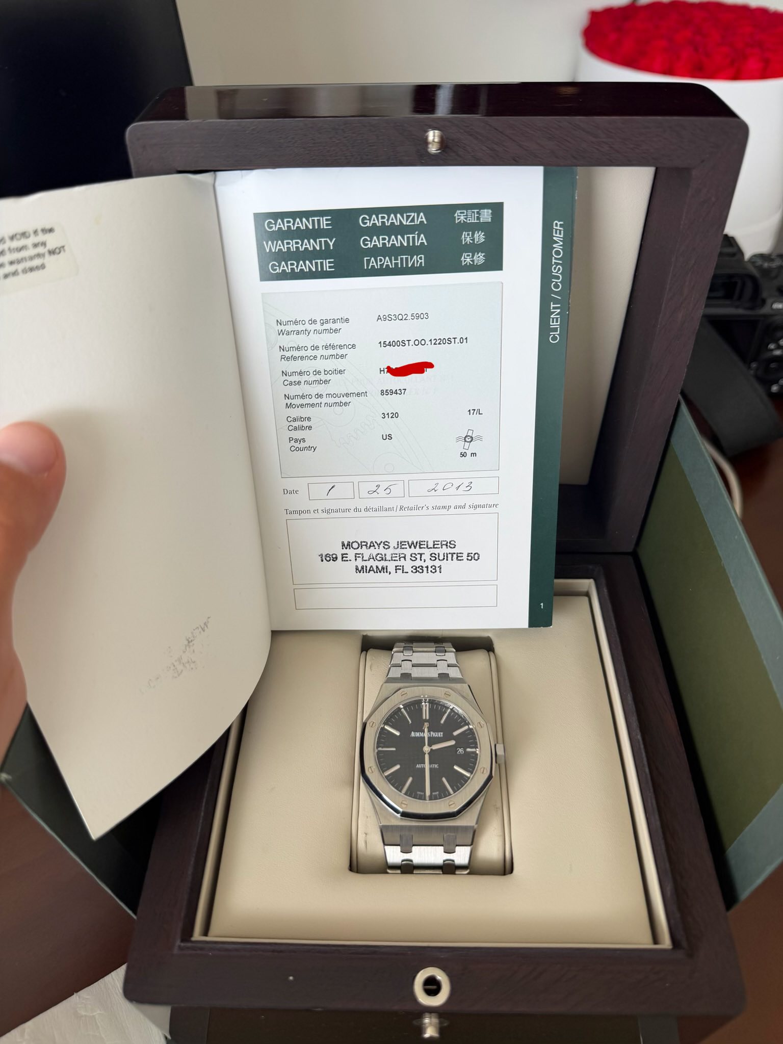 May be an image of wrist watch and text