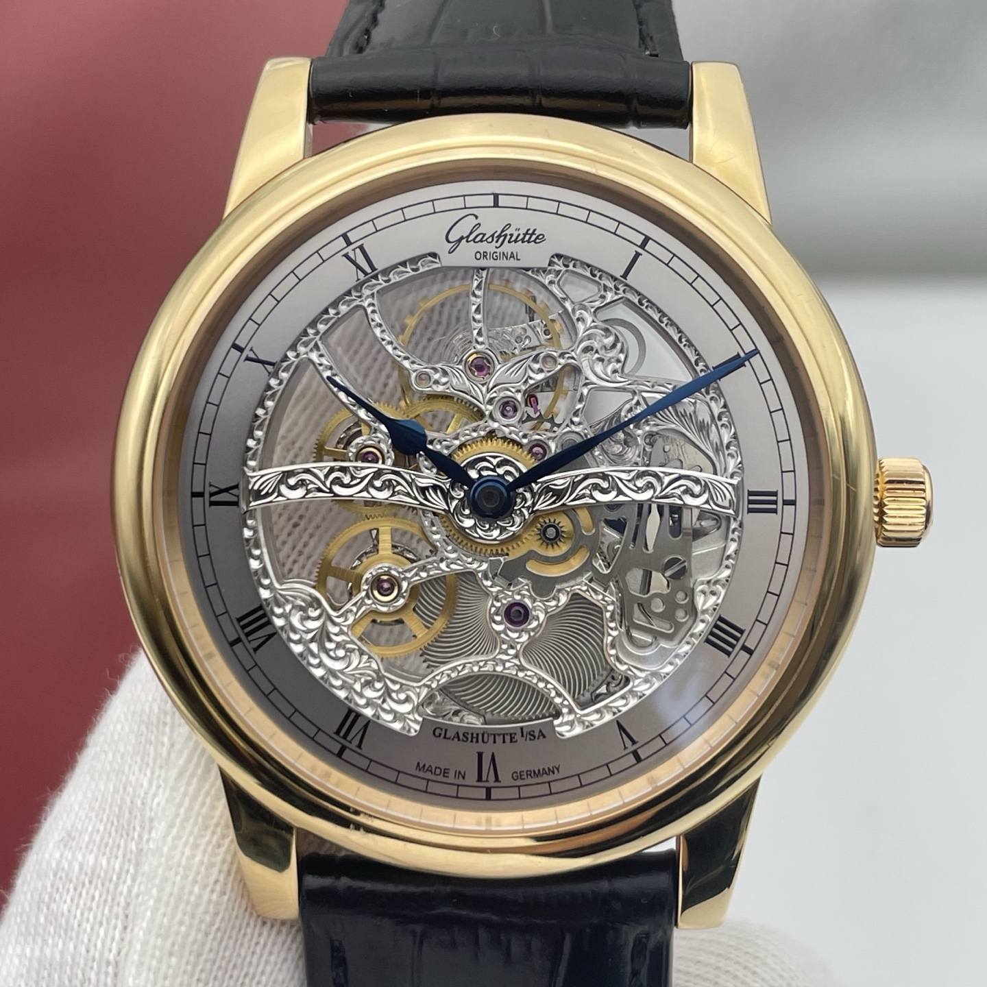 May be an image of wrist watch and text