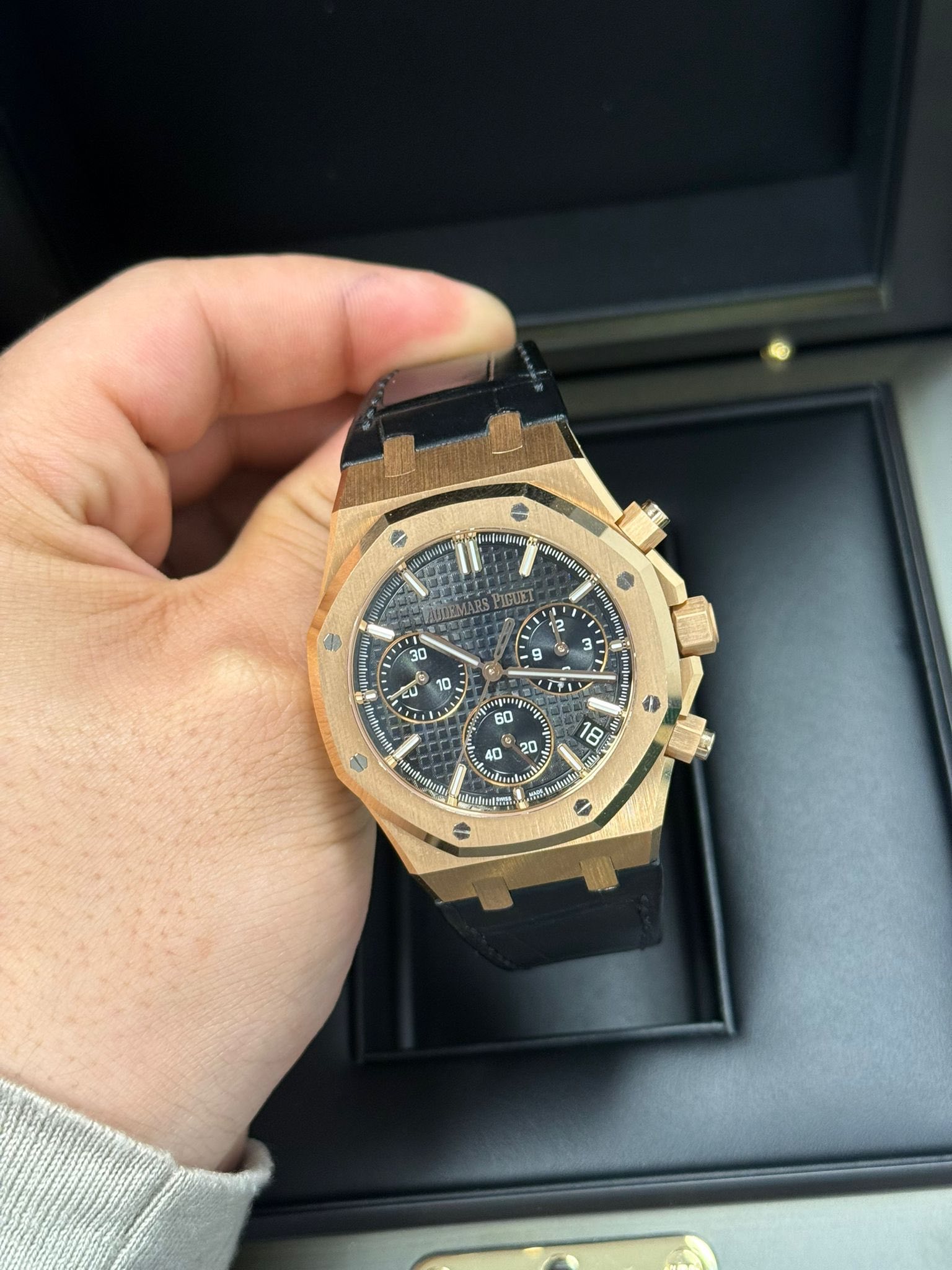 May be an image of wrist watch and text