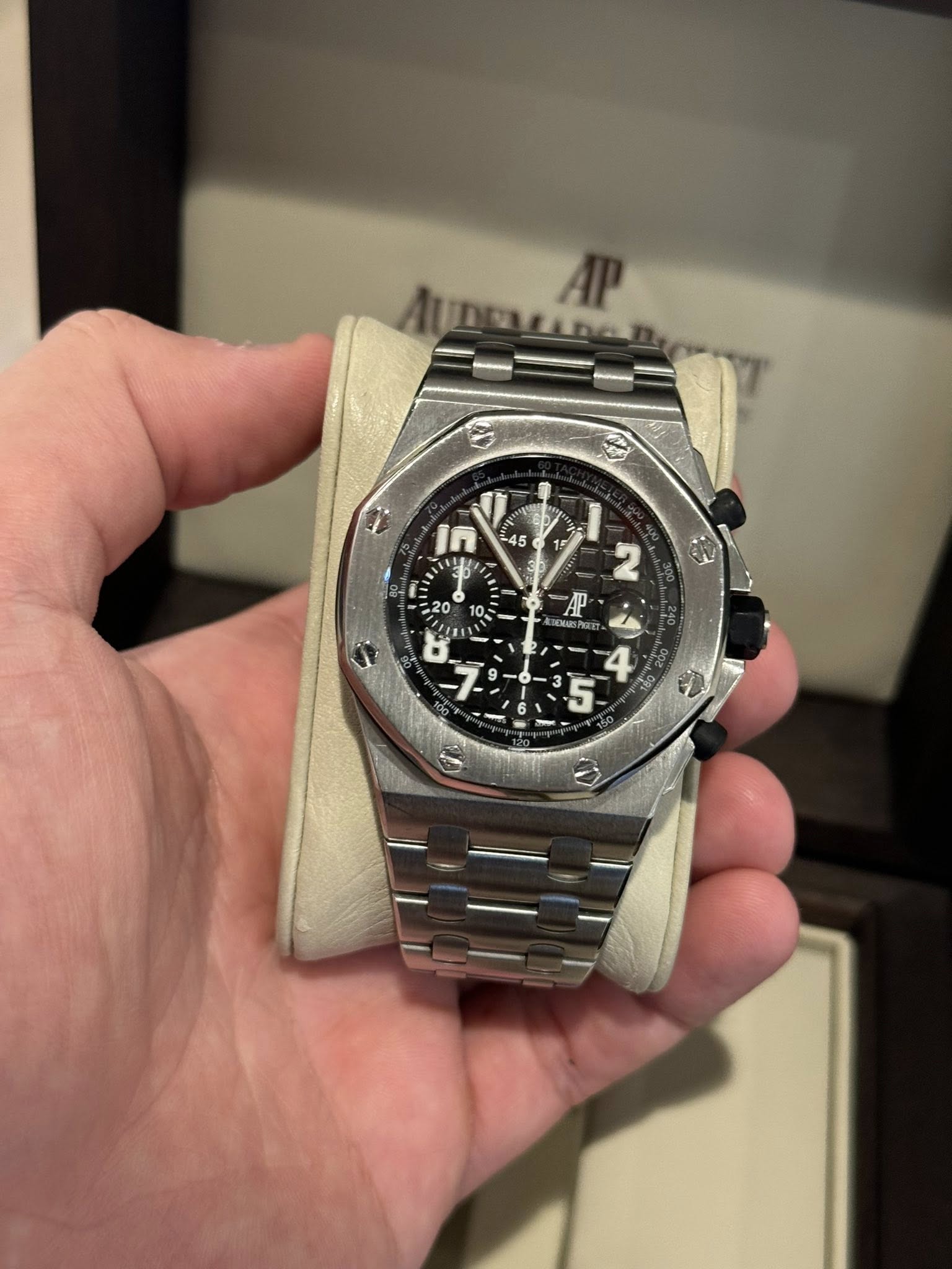 May be an image of wrist watch and text