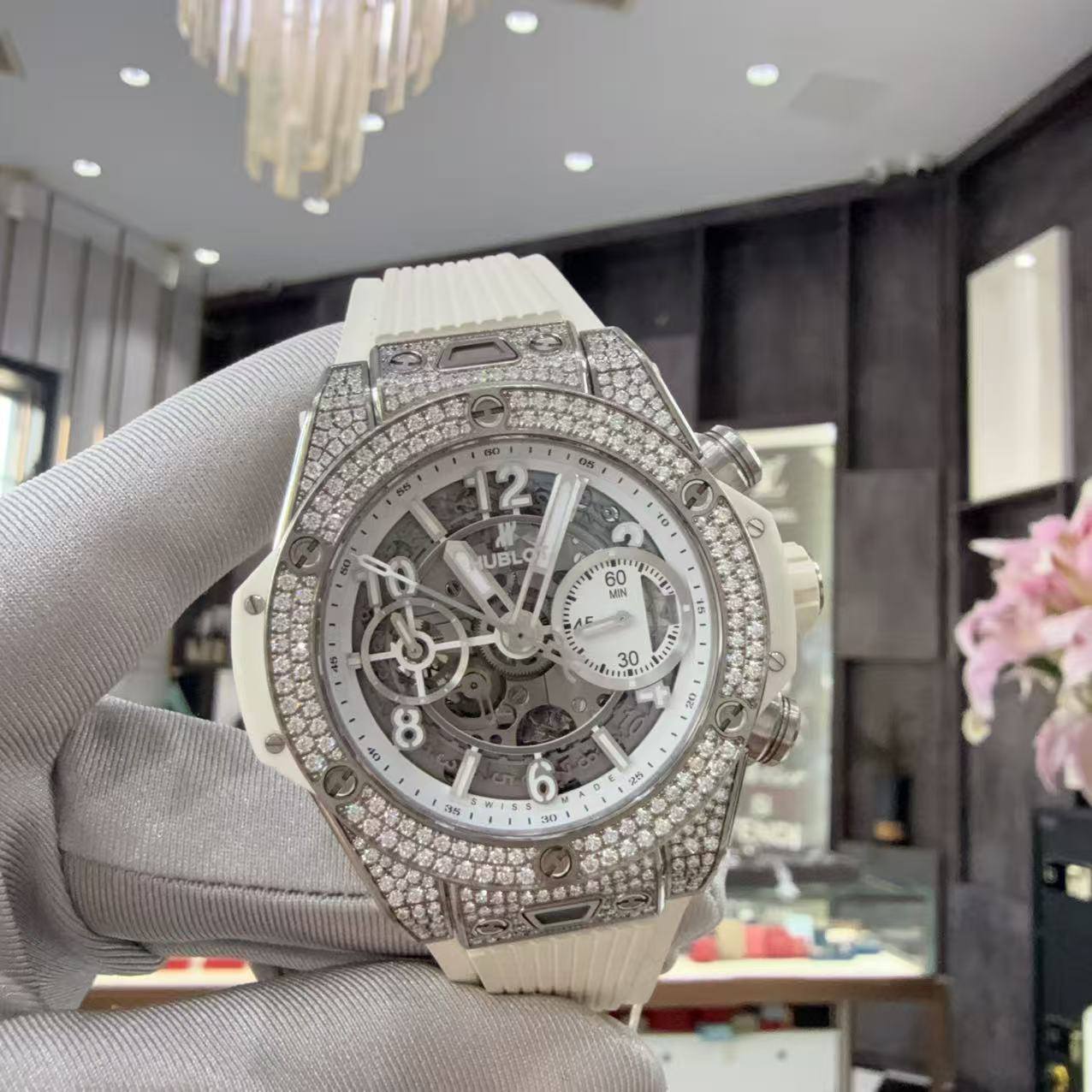 May be an image of wrist watch and text