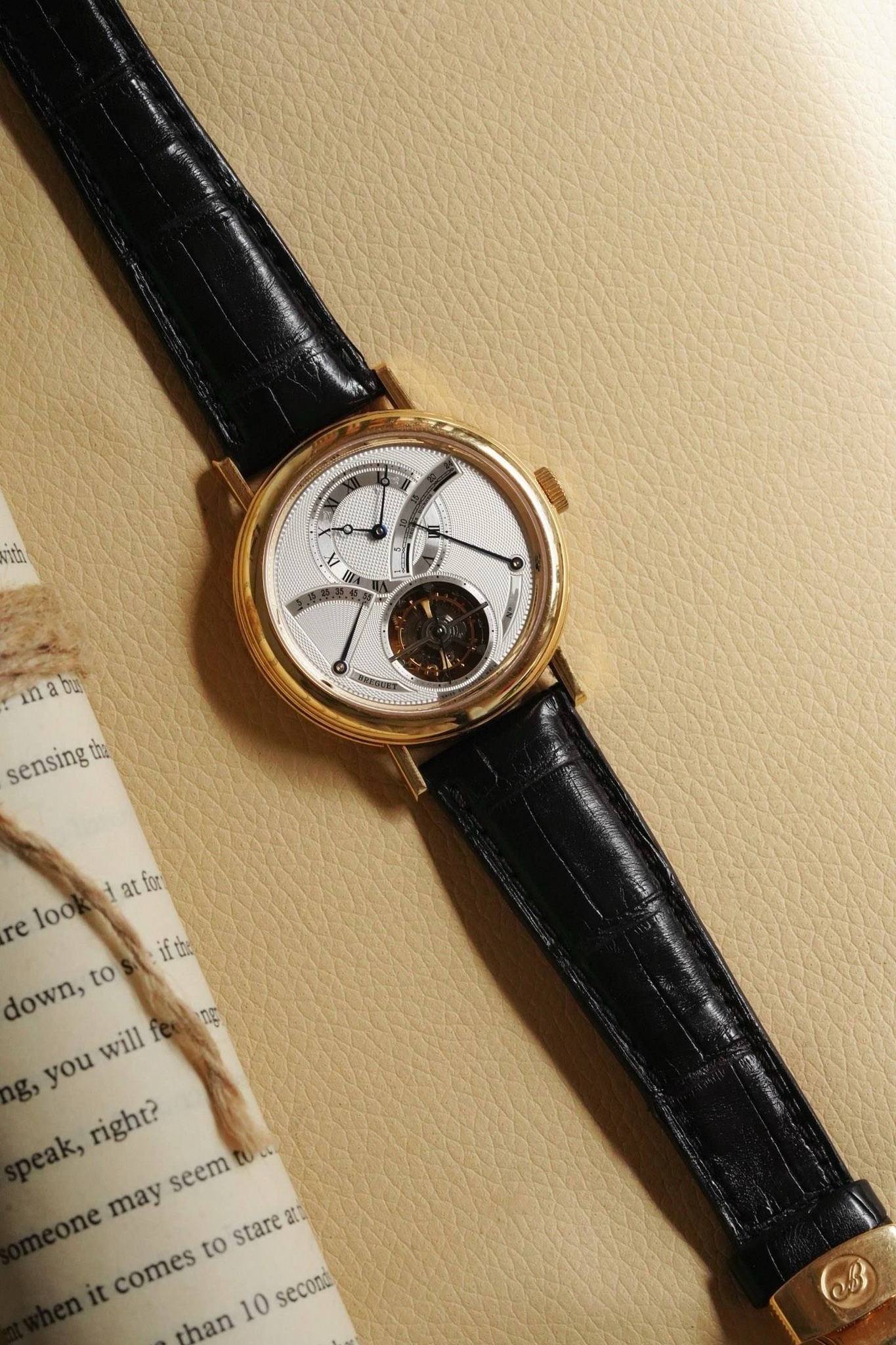 May be an image of wrist watch and text