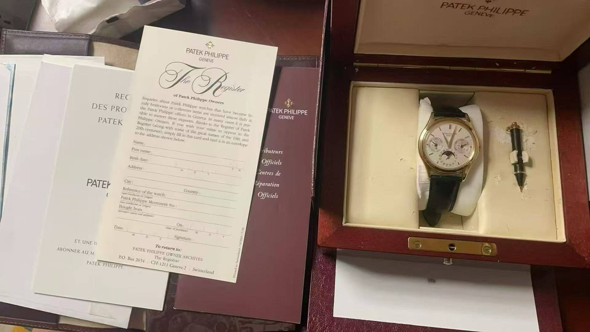 May be an image of wrist watch and text