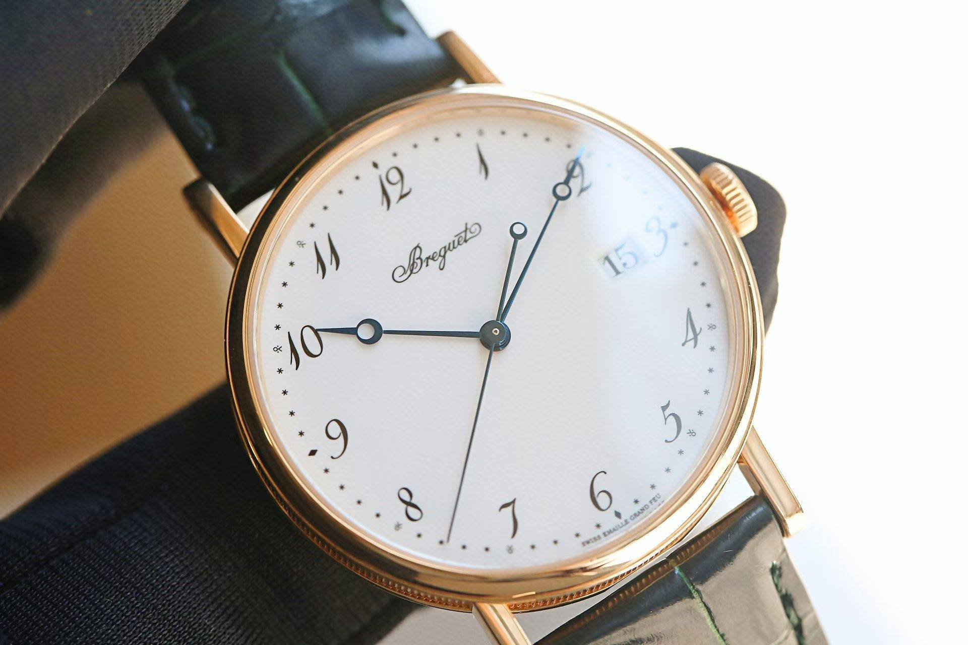 May be an image of wrist watch and text that says 'Bregueto ፈ 153 15 中 * 5 * a 6 GRAND * FBU อย PWINS: EMAIL 8 ٦'
