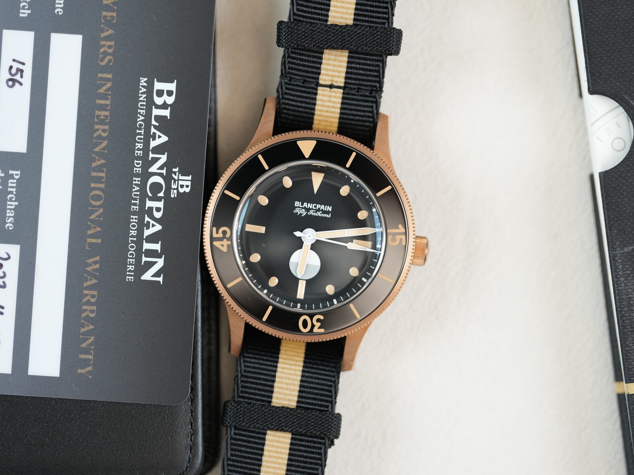 May be an image of wrist watch and text that says 'ပျာ J อน 951 I EARS INTERNATIONA MANUFACTURE IN BLANCPAIN BLAI DE HAUTE HH MANUFACTUREDEHA 1735 HORLOGERIE 45 BLANCPAIN Coy…