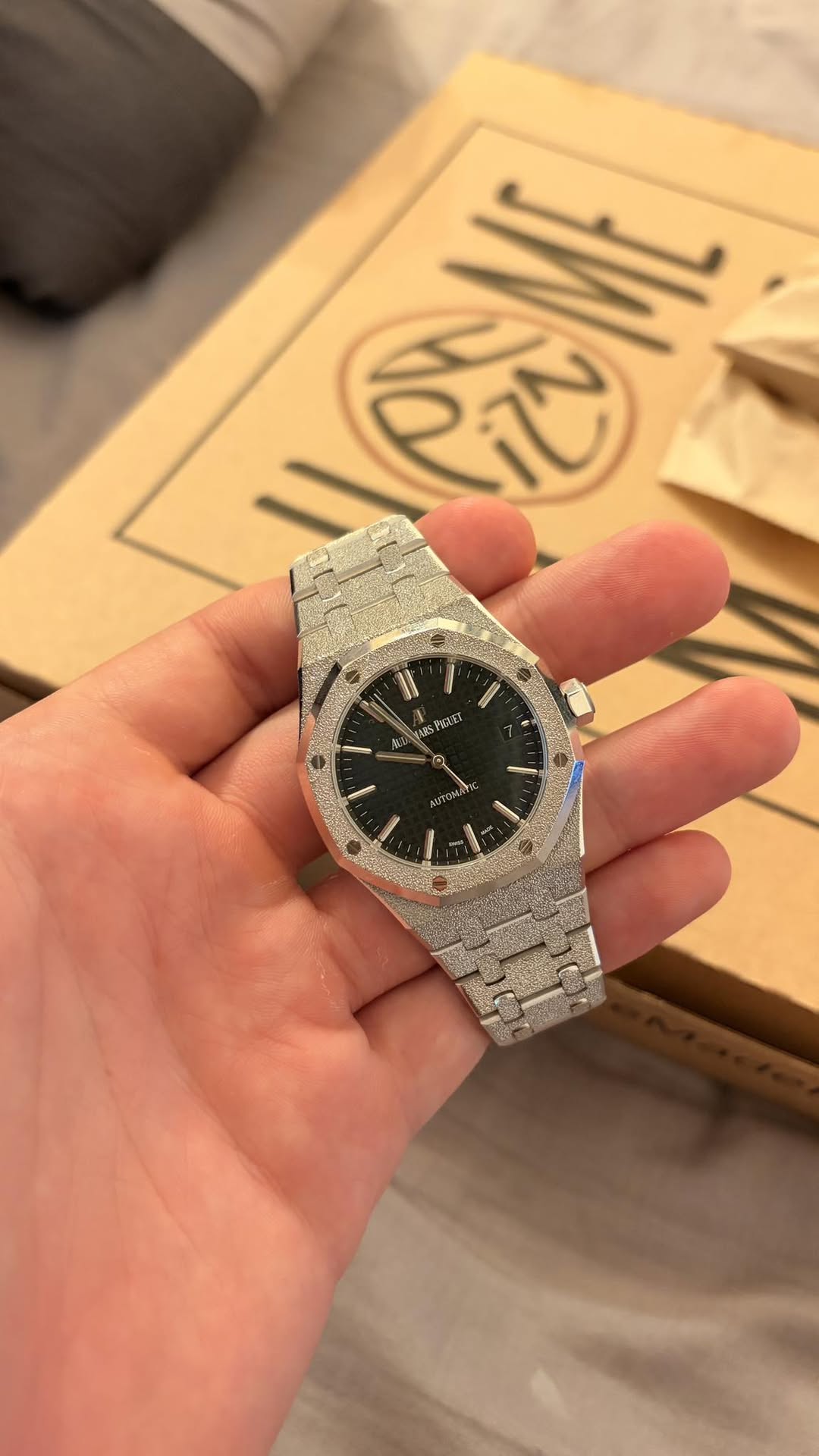 May be an image of wrist watch and text
