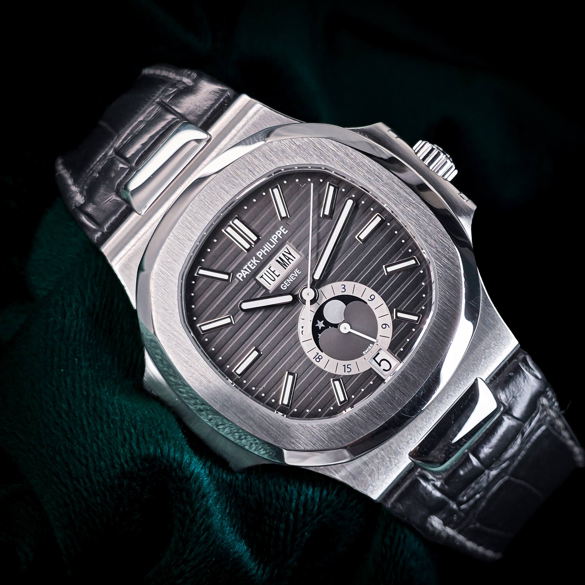 May be an image of wrist watch and text