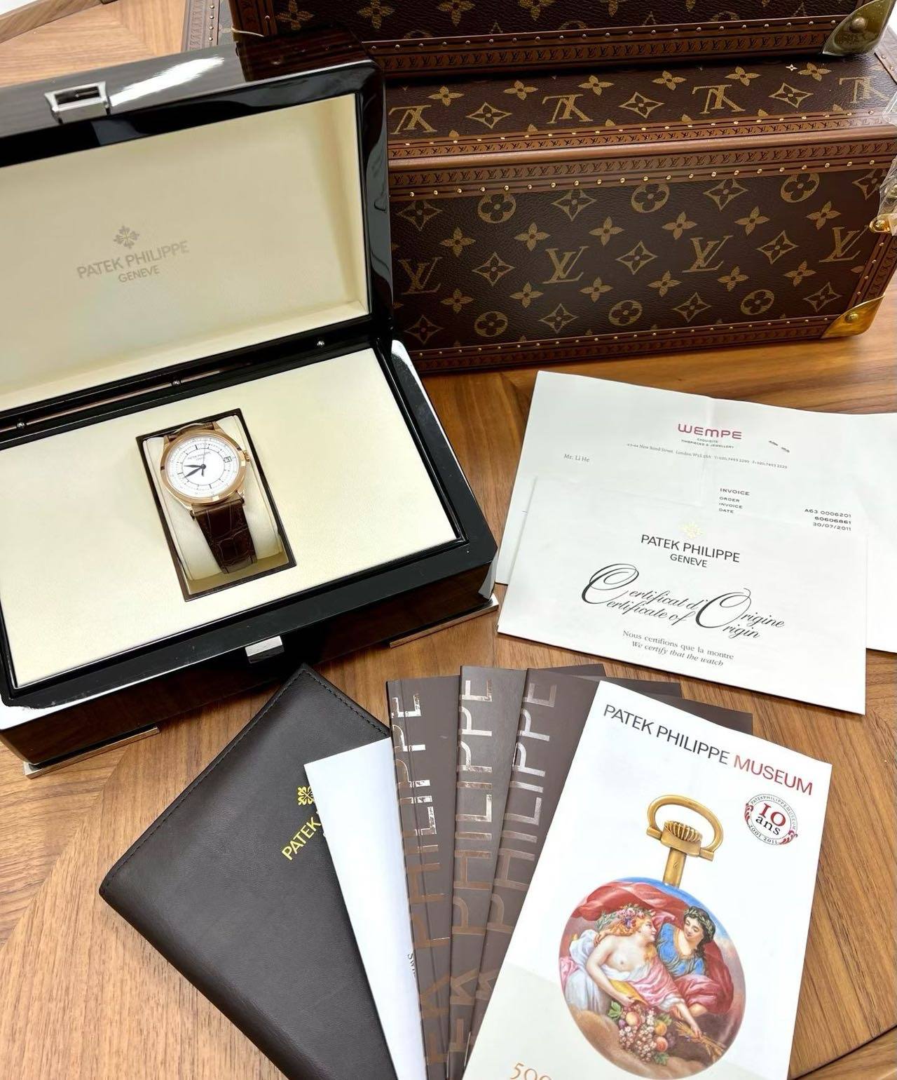 May be an image of wrist watch and text