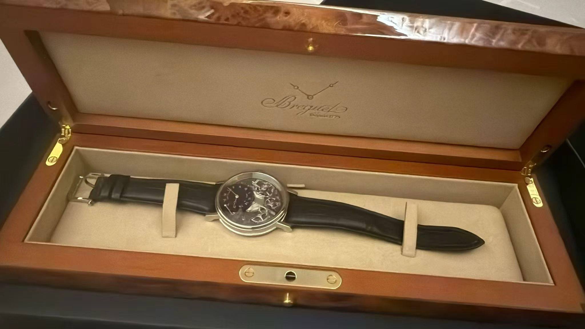May be an image of wrist watch