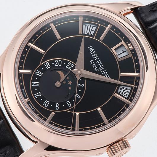 May be an image of wrist watch and text that says 'TUE PATEK PATEKPHILIPP EK [1 E 18 20 22 GENEVE PHILIPP 9/ -18-20-22 tl 2 SIMS A וג APP MAEE 4E OI 8 ! و'