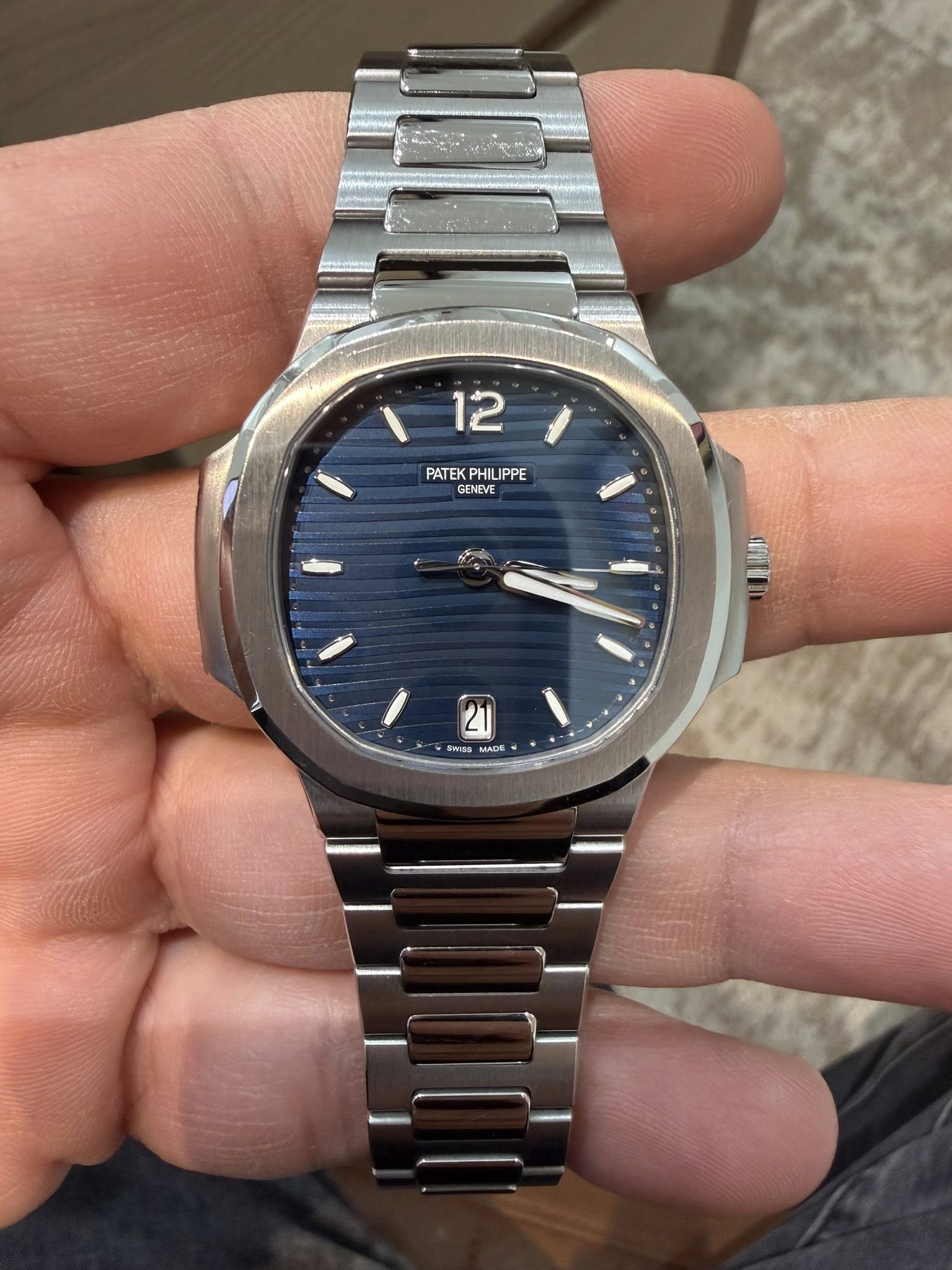 May be an image of wrist watch and text that says '12 PATEK PATEKPHILIPPE PHILIPPE PHIL IPPE IPP GENEVE MTE 21 Swas MADE'