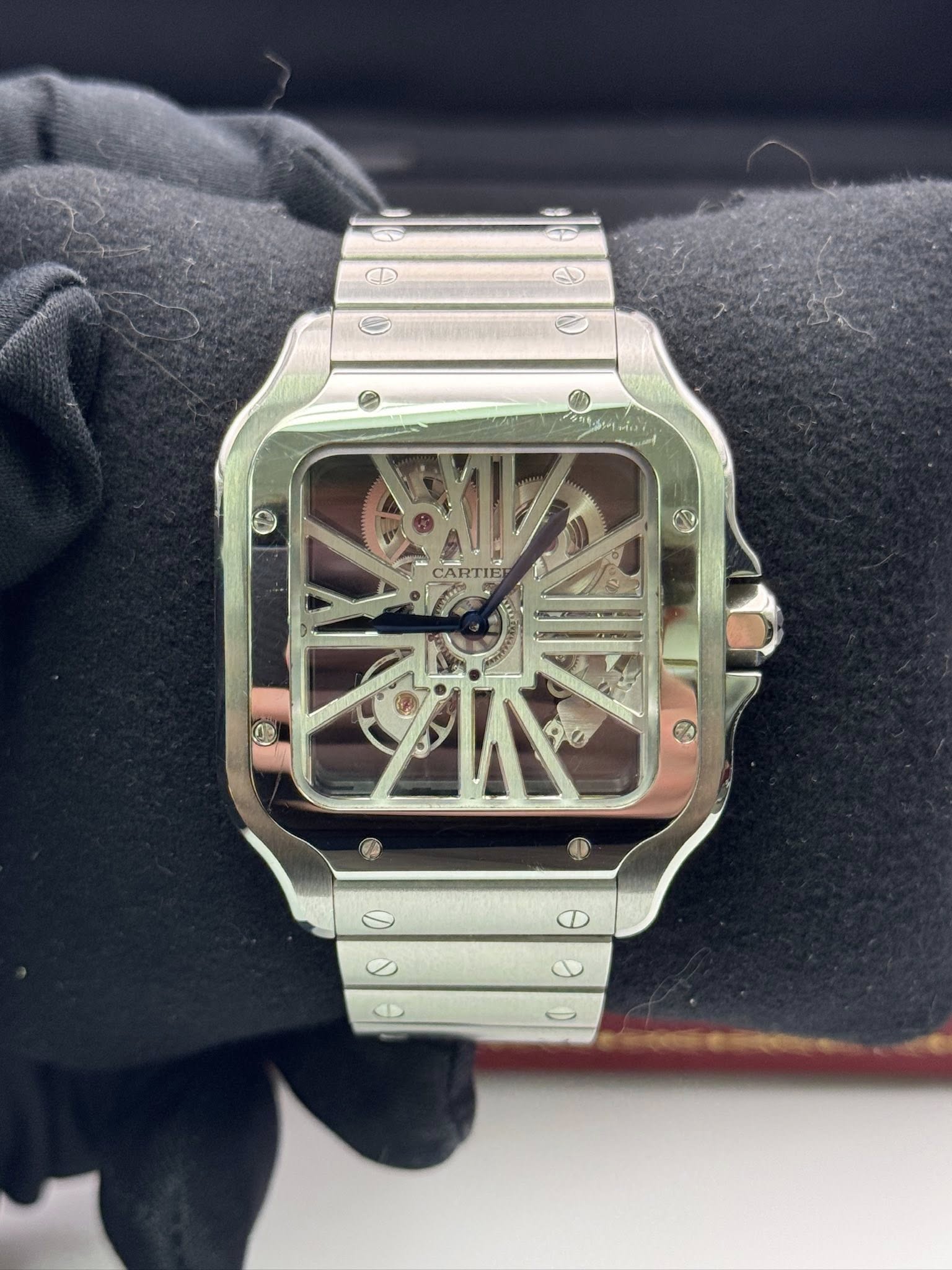 May be an image of wrist watch and text