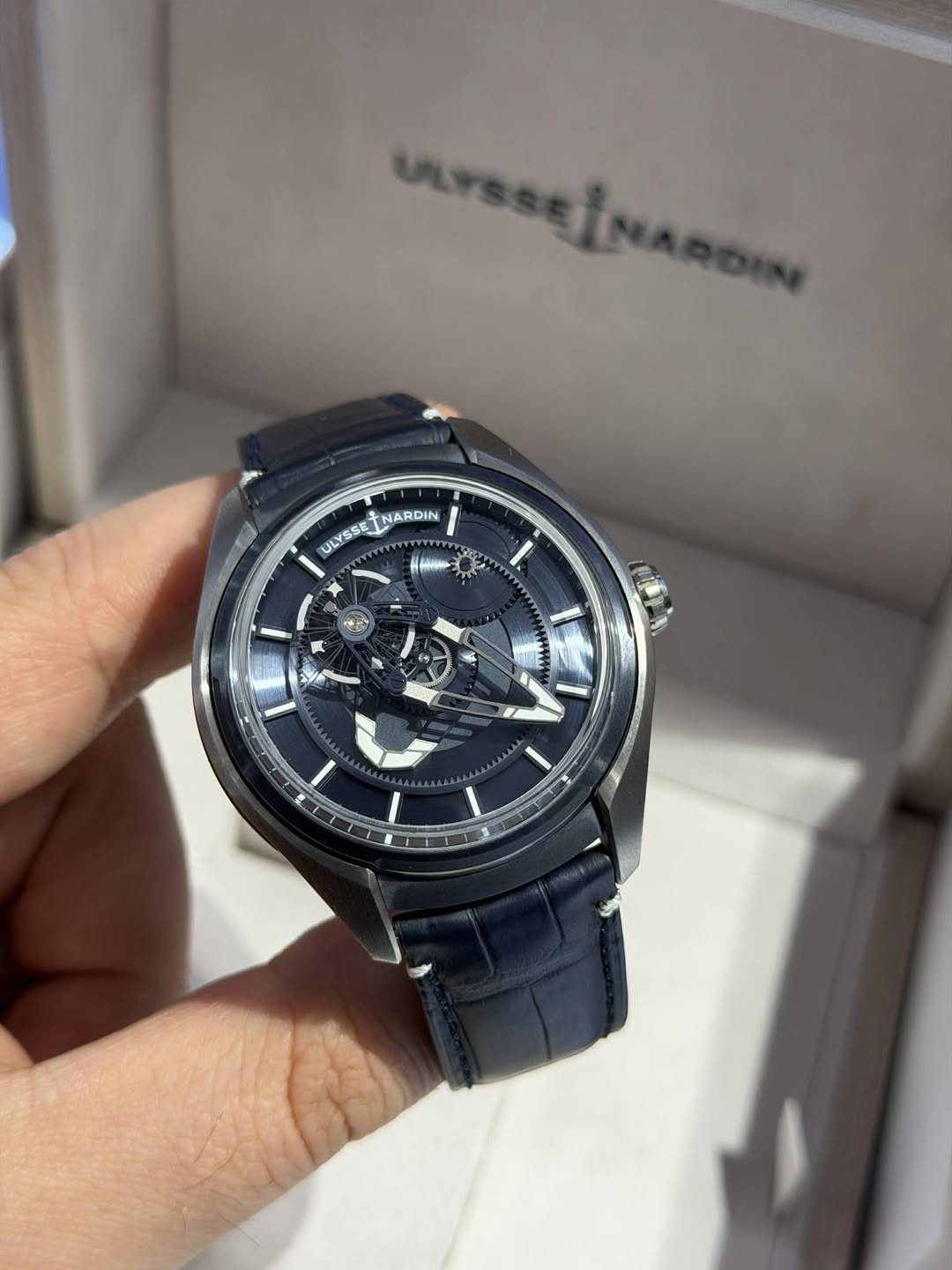 May be an image of wrist watch and text