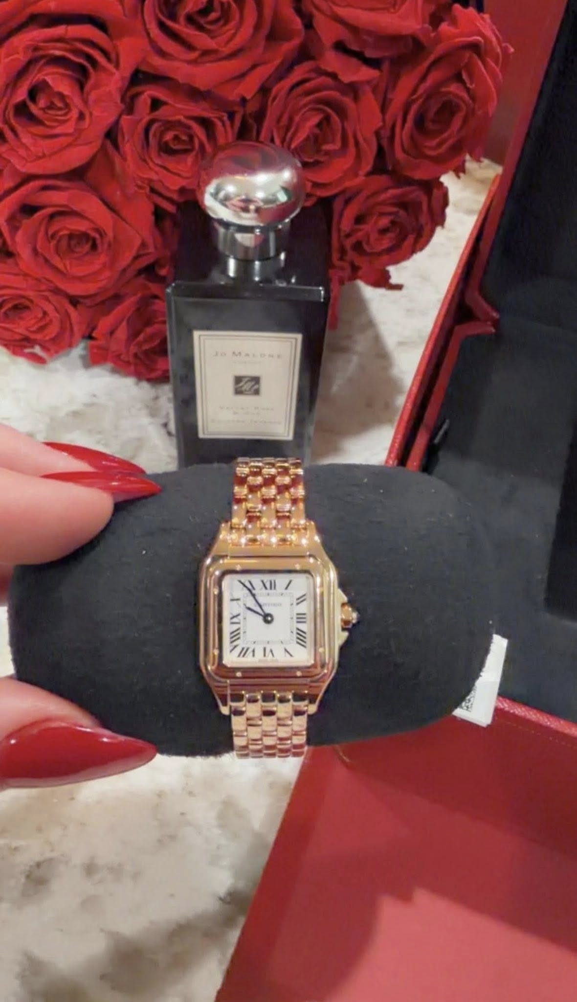 May be an image of wrist watch, fragrance and text
