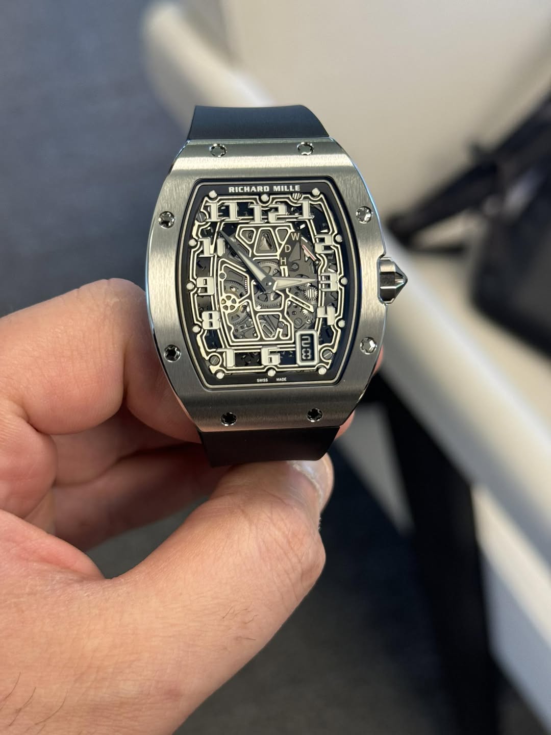 May be an image of wrist watch and text that says 'RICHARD RICHAROMILLE MILLE W ማ വങ'