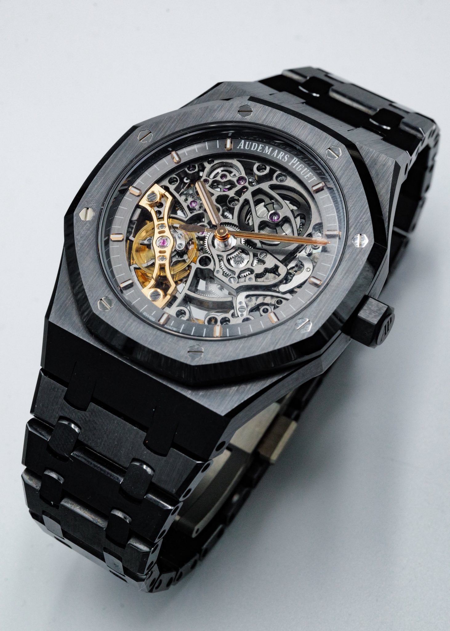 May be an image of wrist watch and text