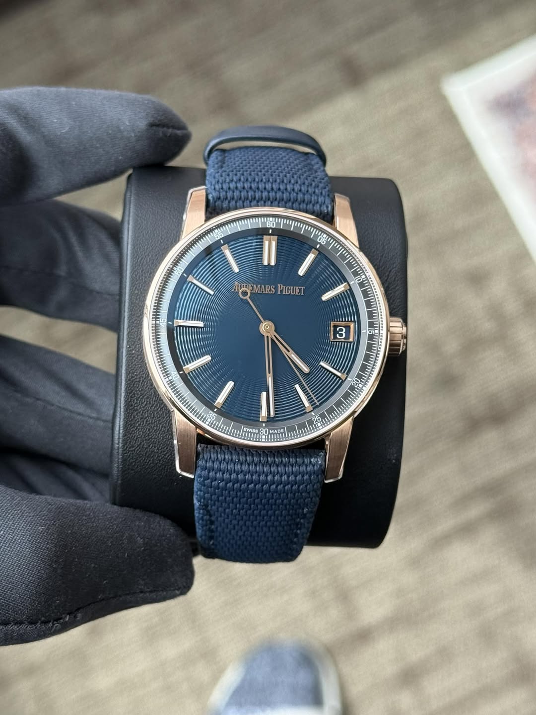 May be an image of wrist watch and text