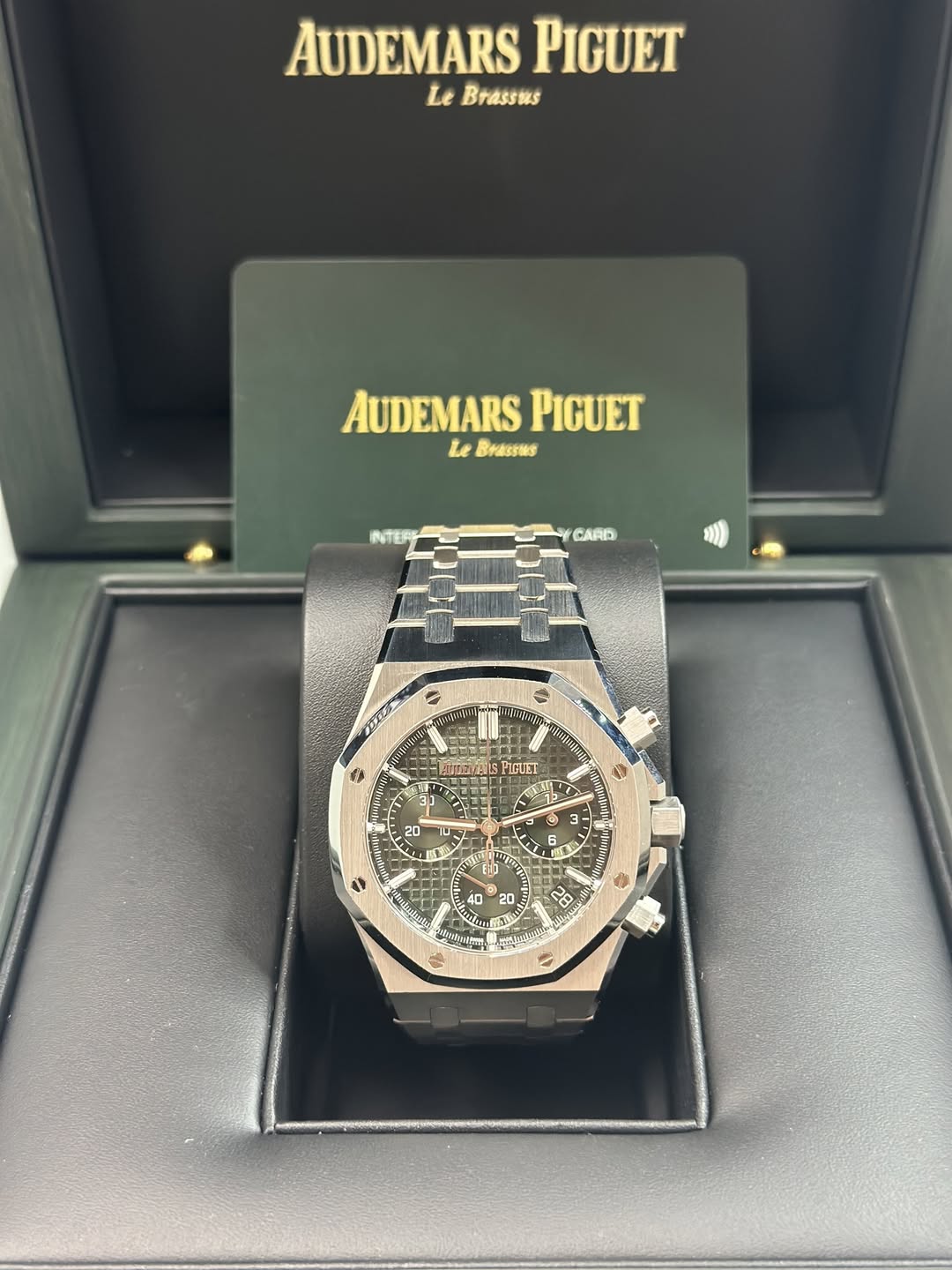 May be an image of wrist watch and text
