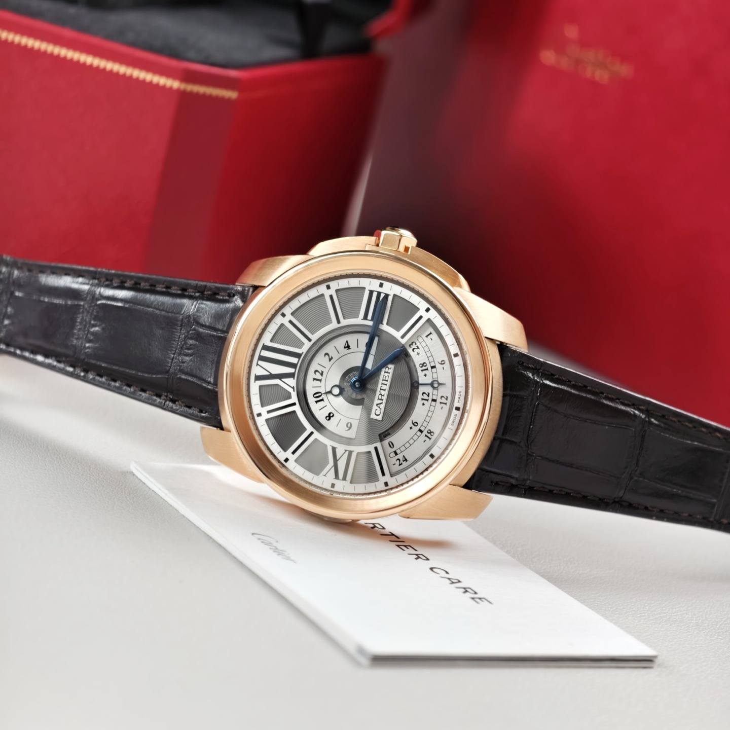 May be an image of wrist watch and text that says '12/ de ARTE 0 E b C 연 ل 50 XII Phoega EF CARE CARE'