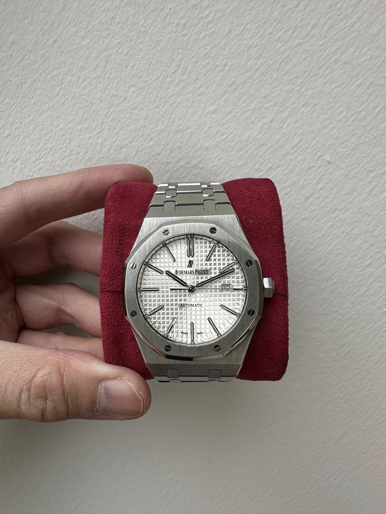 May be an image of digital watch and text