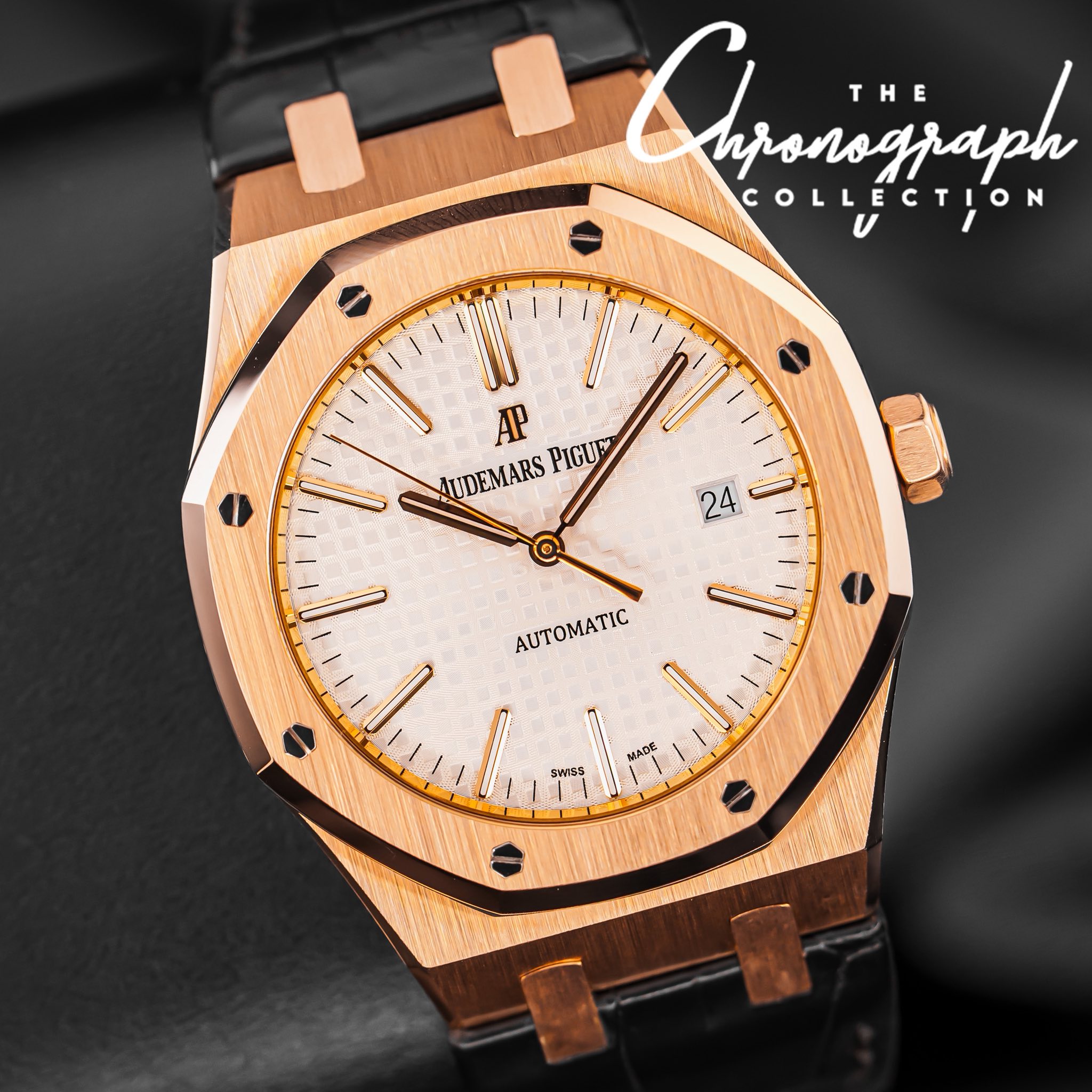May be an image of wrist watch and text that says 'Alyanajaph THE THE uponograph COLLECTION AP UDEMARSPIGUE UDEMARS PIGUE 1/ 24 AUTOMATIC MAD袋 ราครธ'