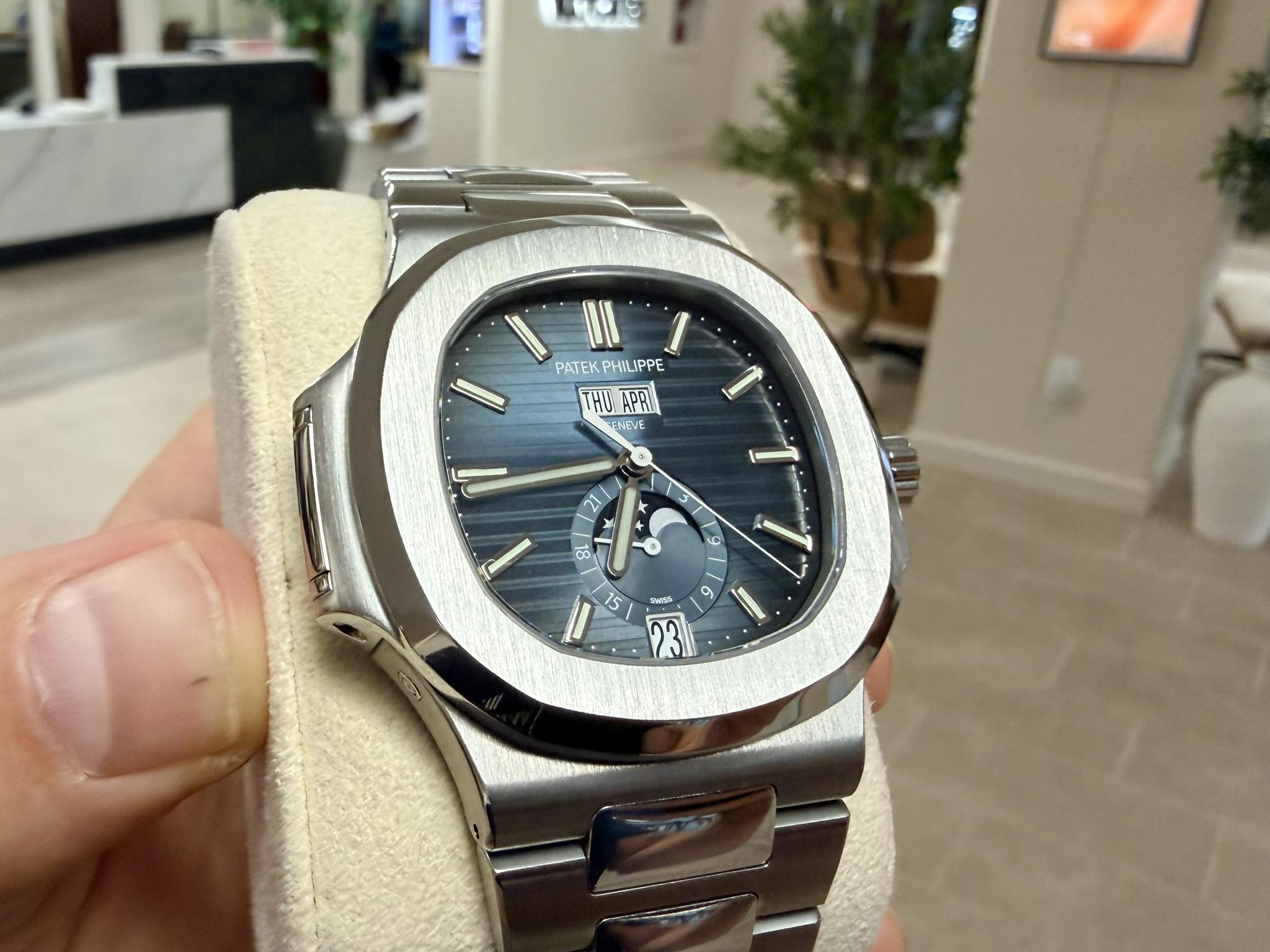 May be an image of wrist watch and text