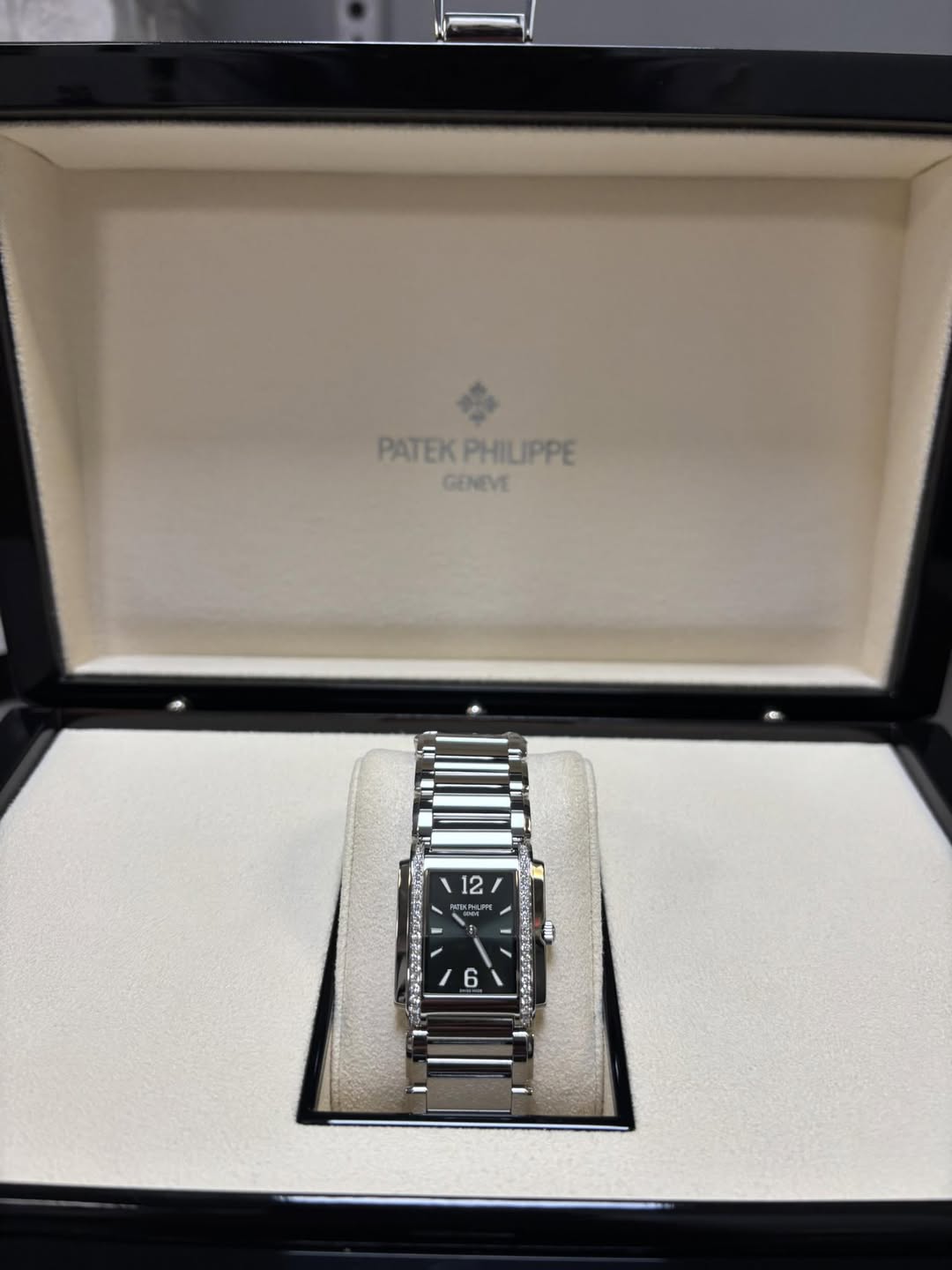May be an image of wrist watch and text