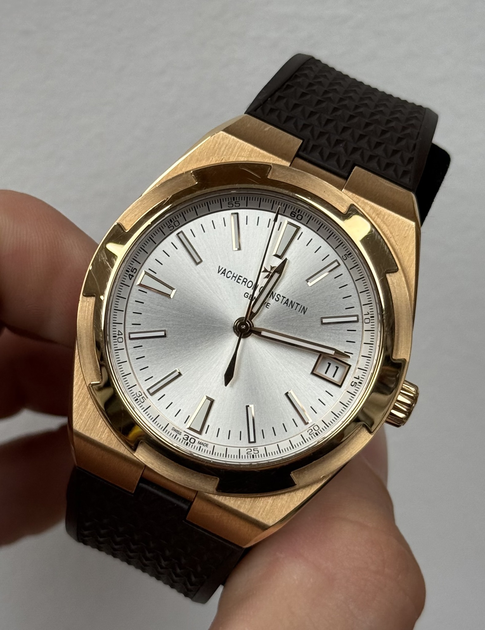 May be an image of wrist watch and text