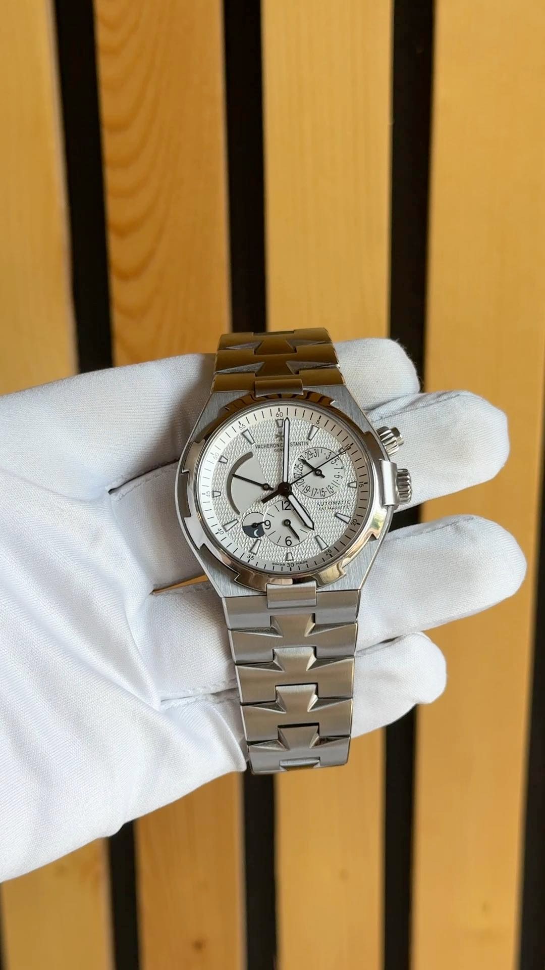 May be an image of wrist watch and text