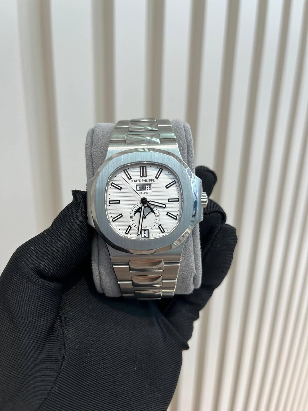 May be an image of wrist watch and text