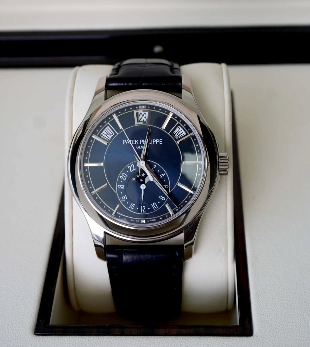 May be an image of wrist watch and text