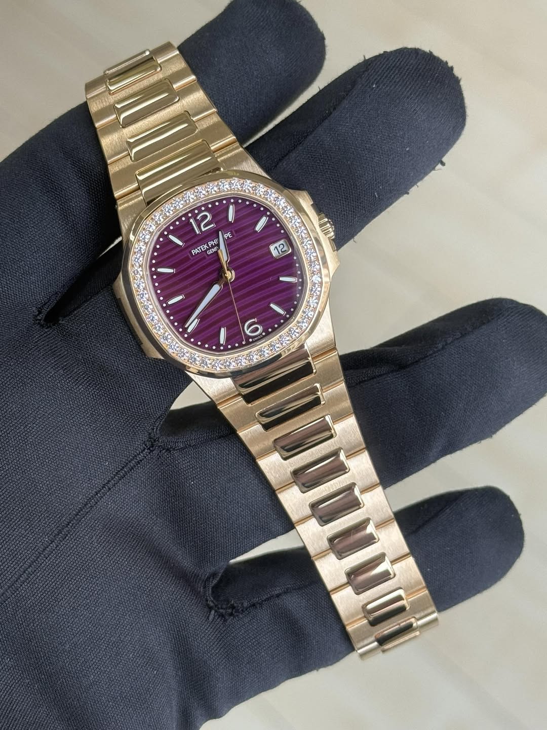 May be an image of wrist watch and text