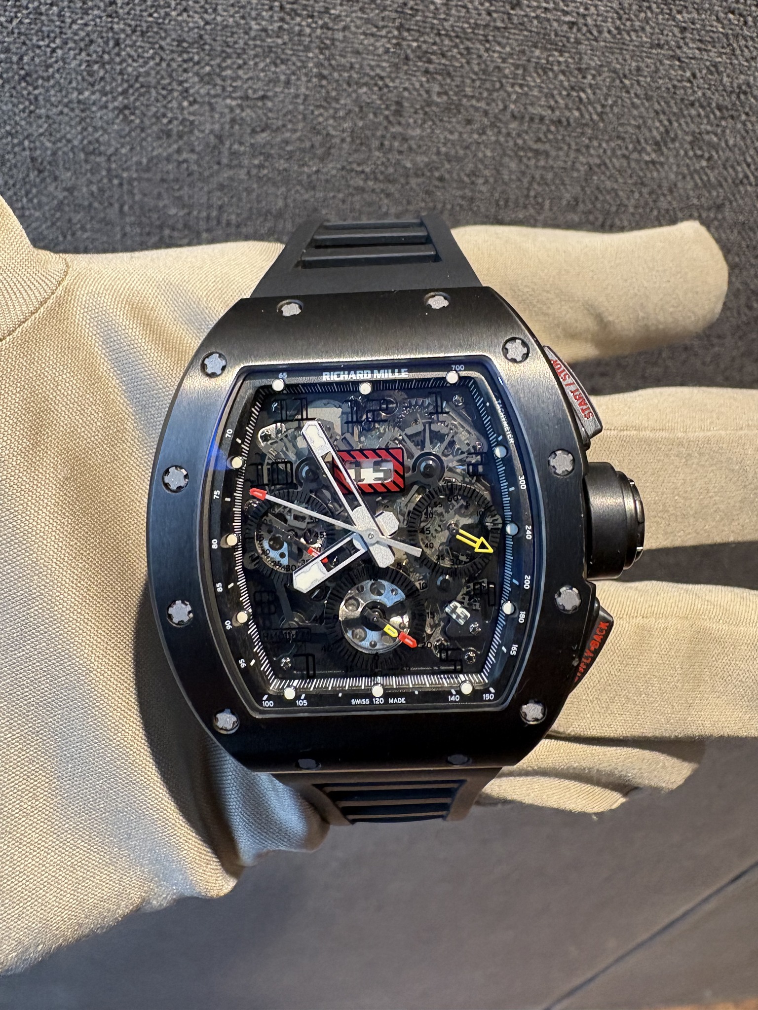 May be an image of wrist watch and text