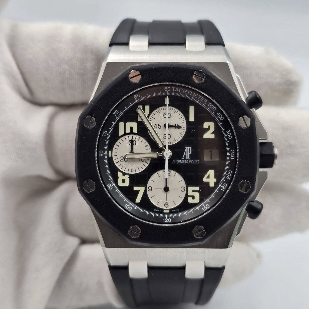 May be an image of wrist watch and text
