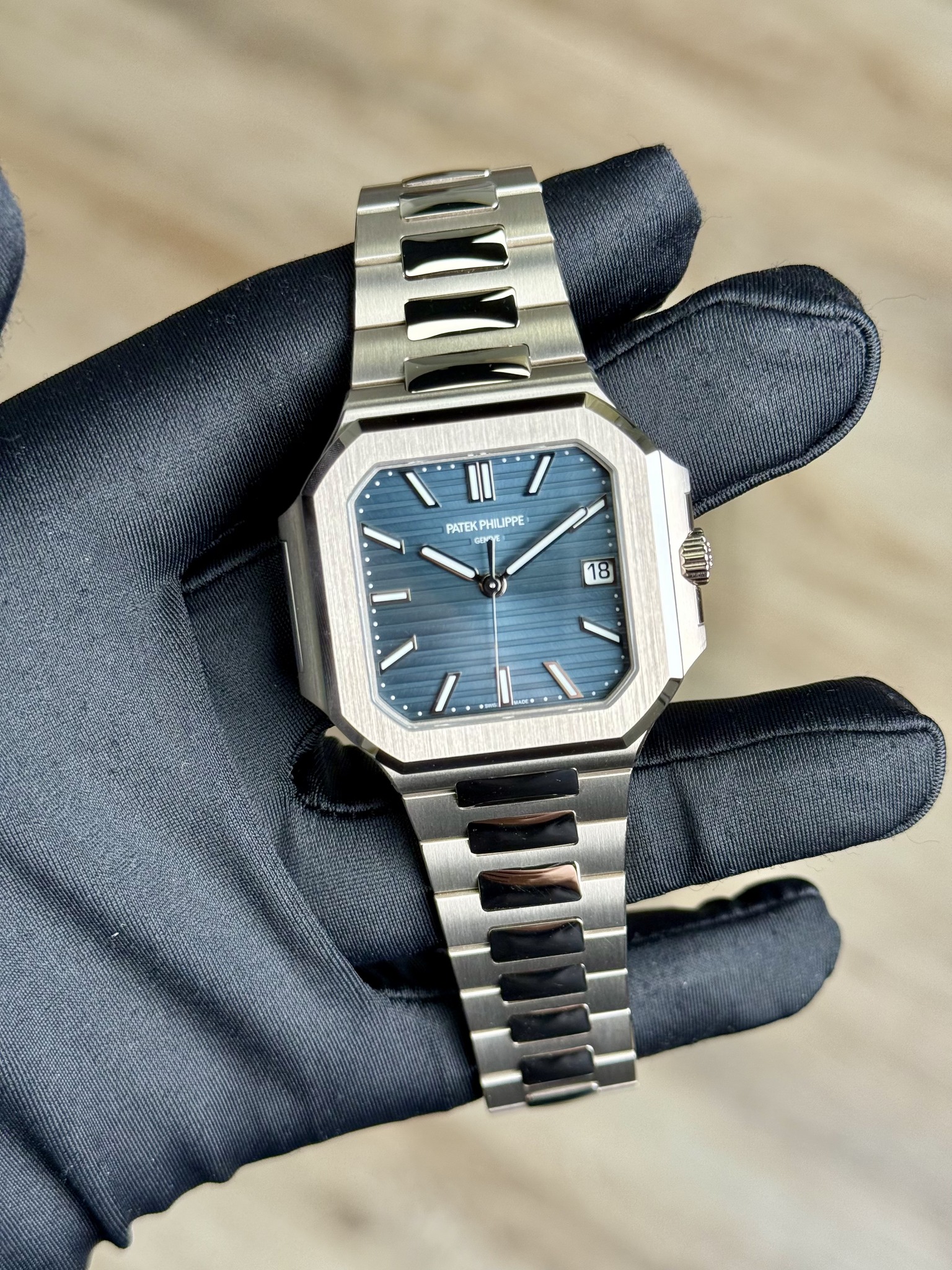 May be an image of wrist watch and text