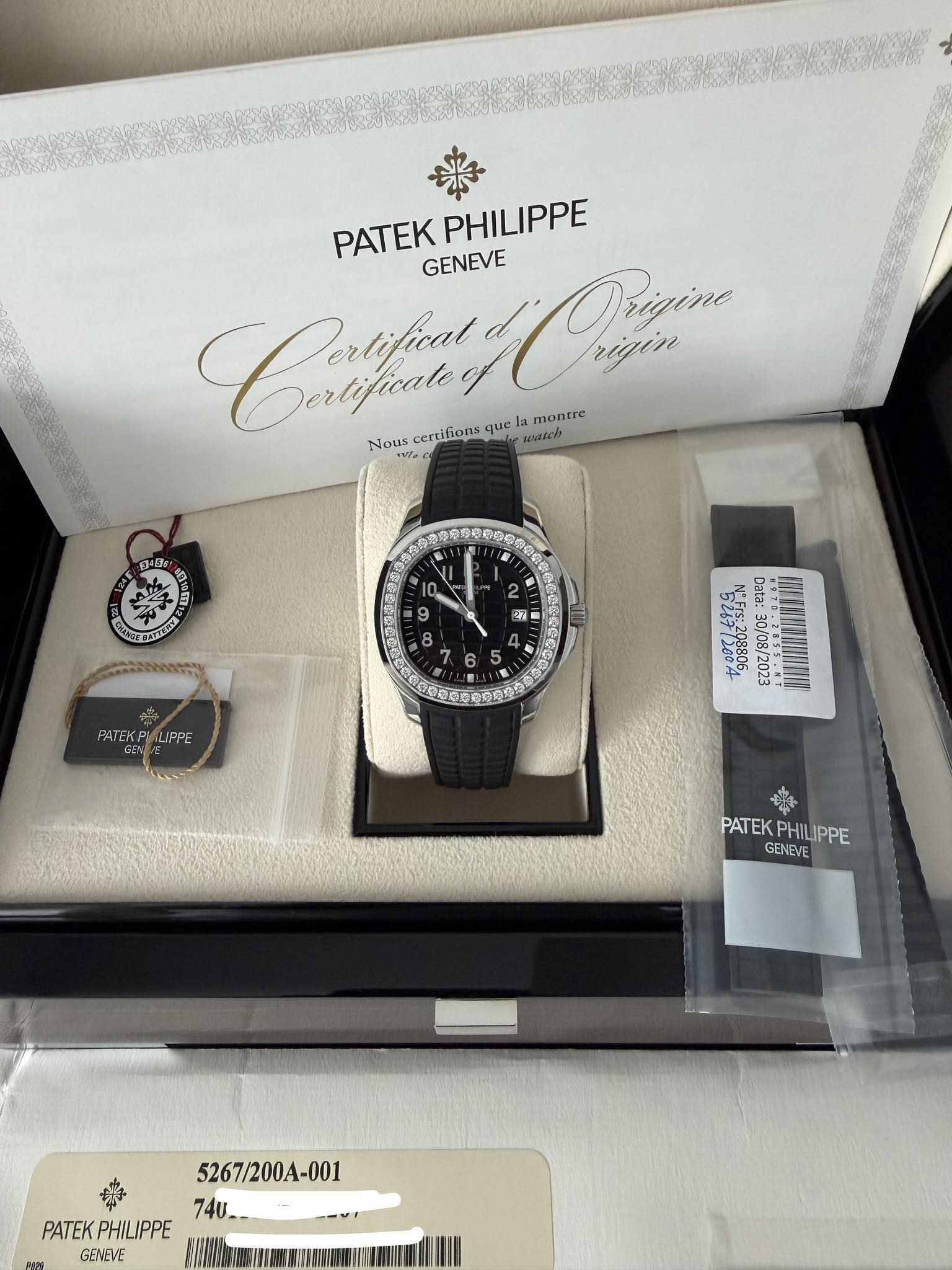 May be an image of wrist watch and text