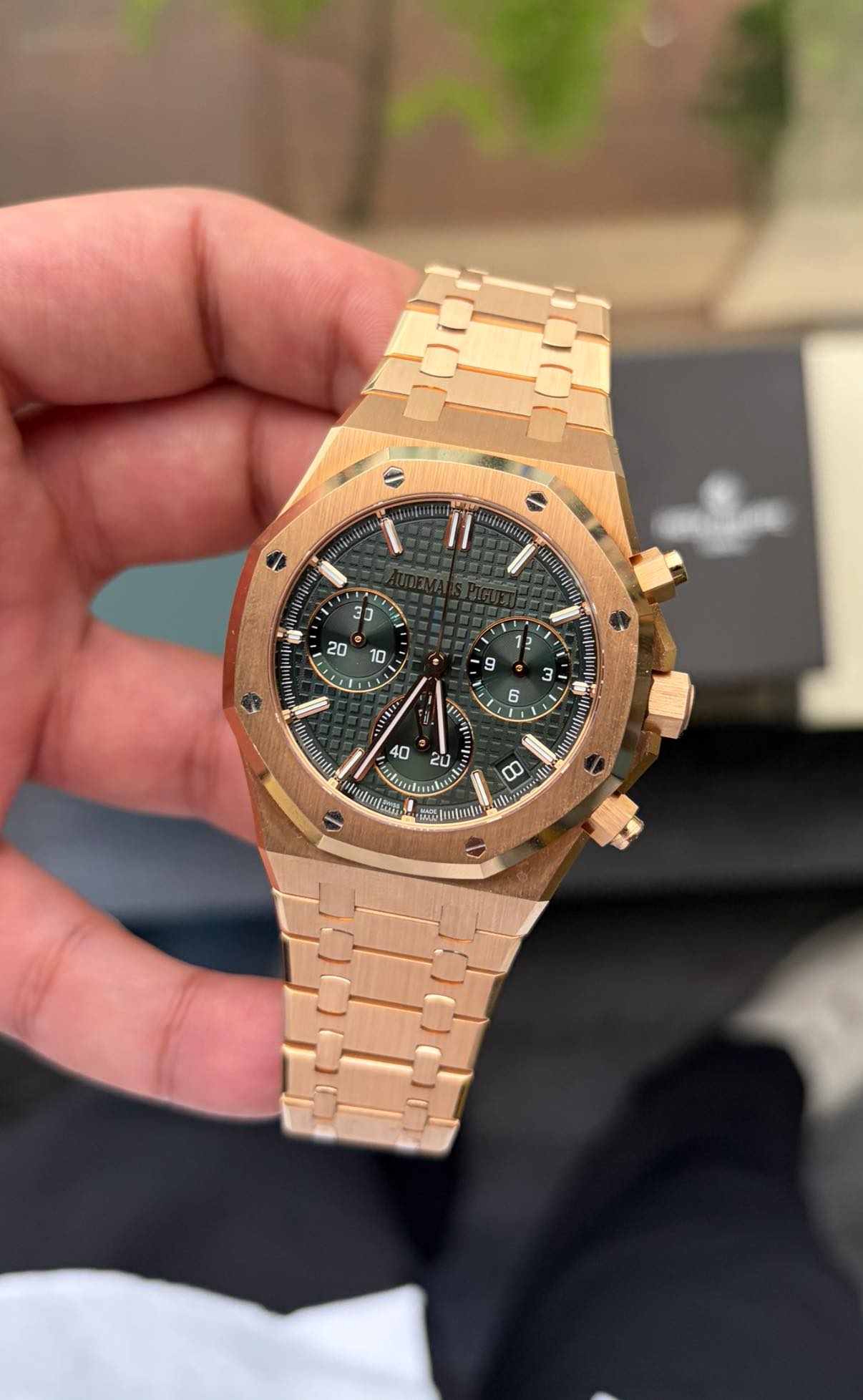 May be an image of wrist watch and text