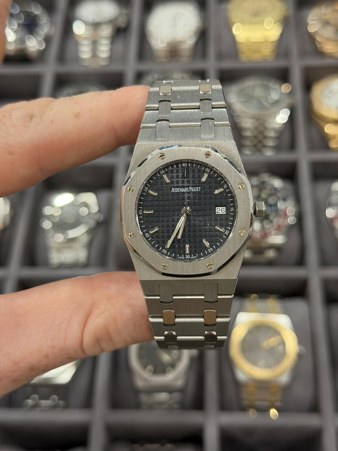 May be an image of wrist watch and text