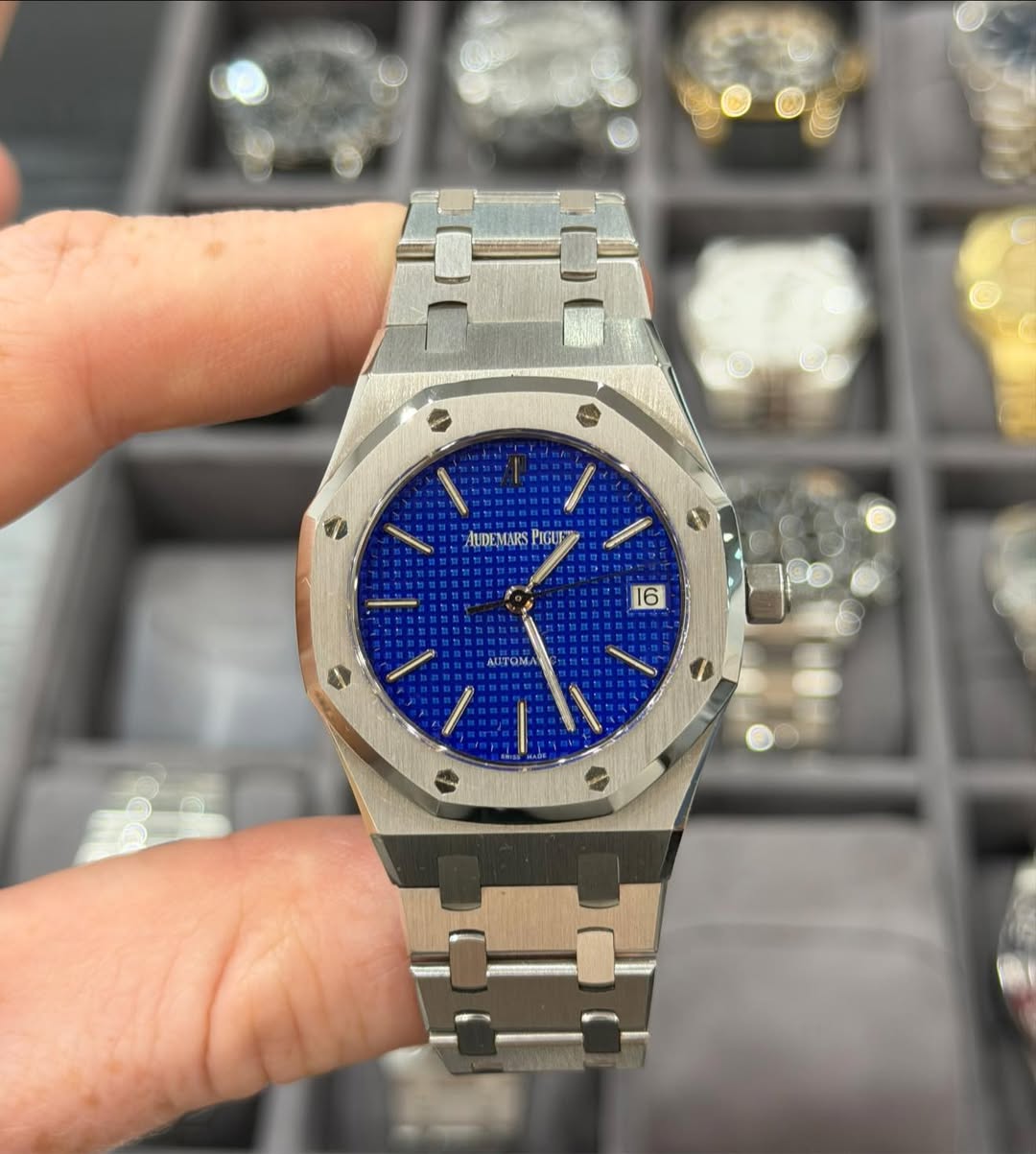 May be an image of wrist watch and text