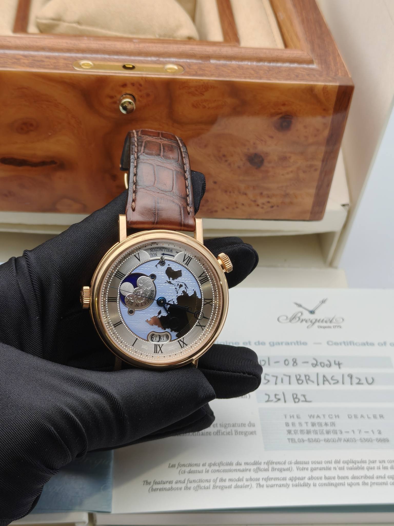 May be an image of wrist watch and text