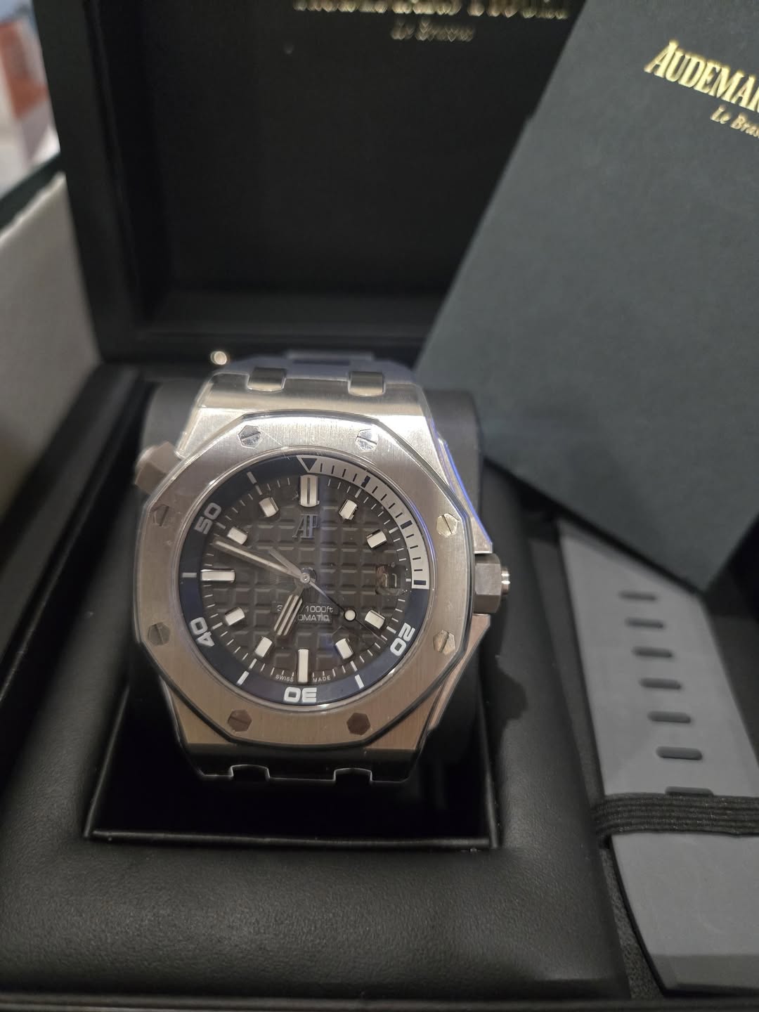 May be an image of wrist watch and text