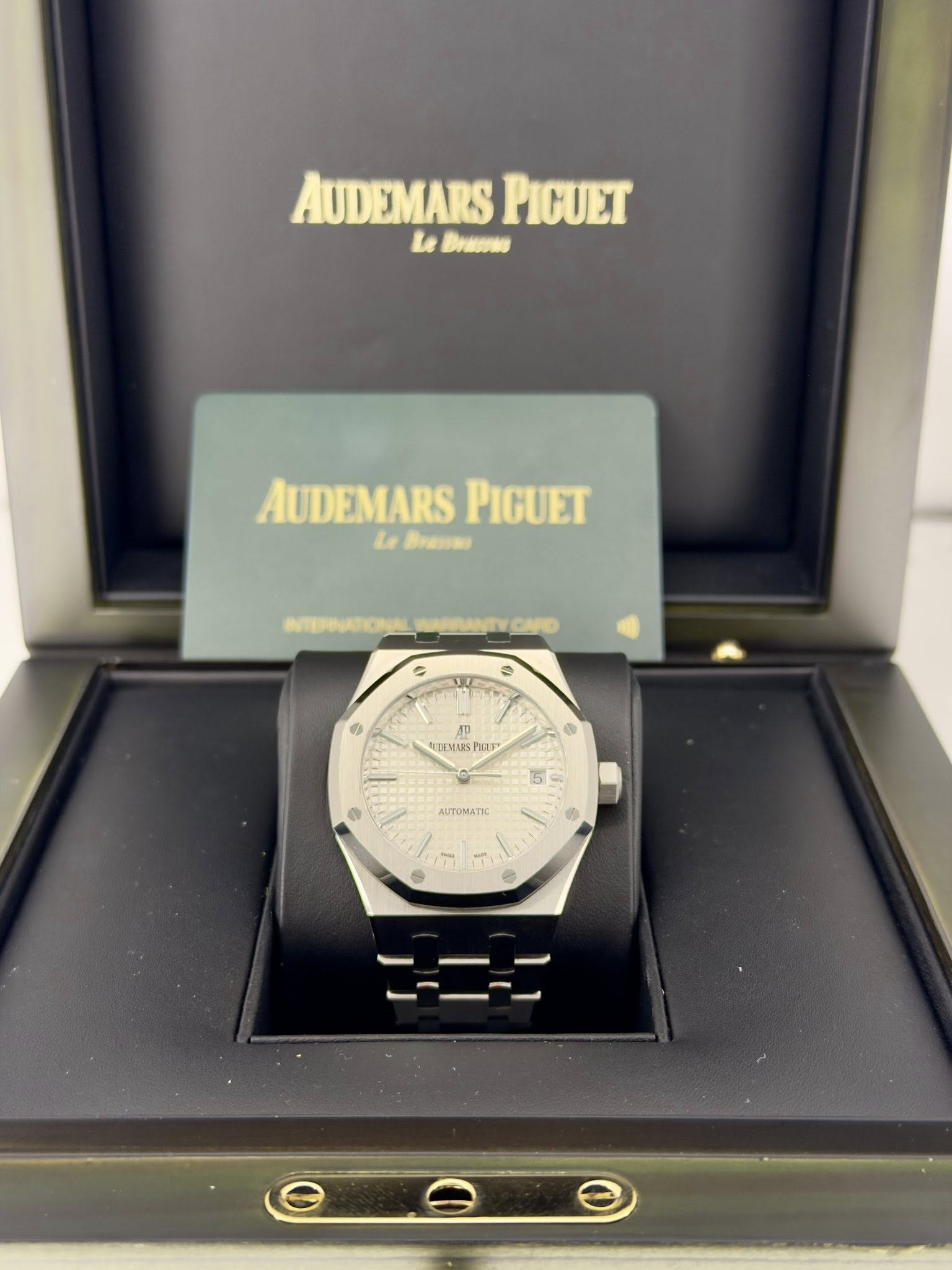 May be an image of wrist watch and text