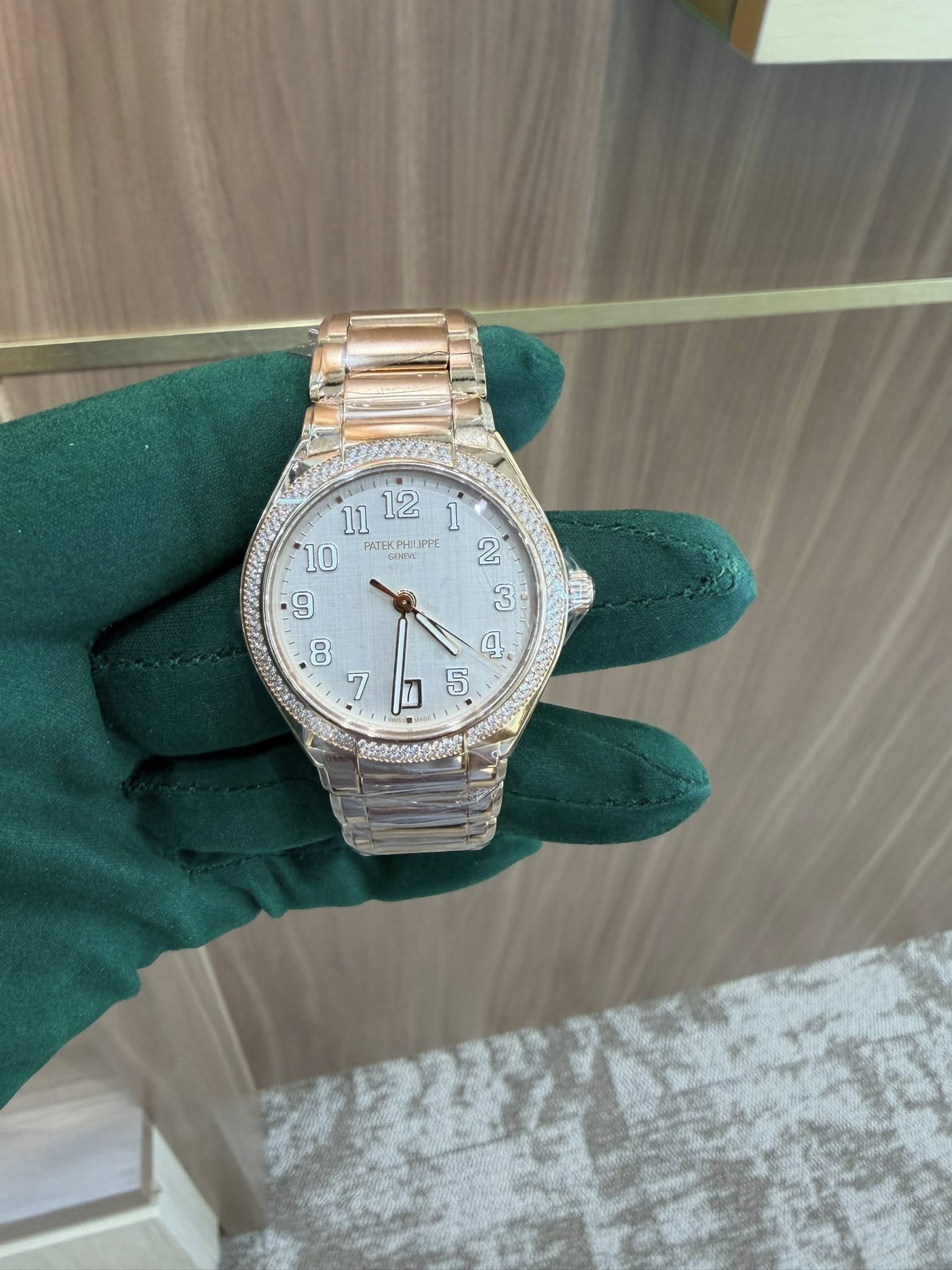 May be an image of wrist watch and text
