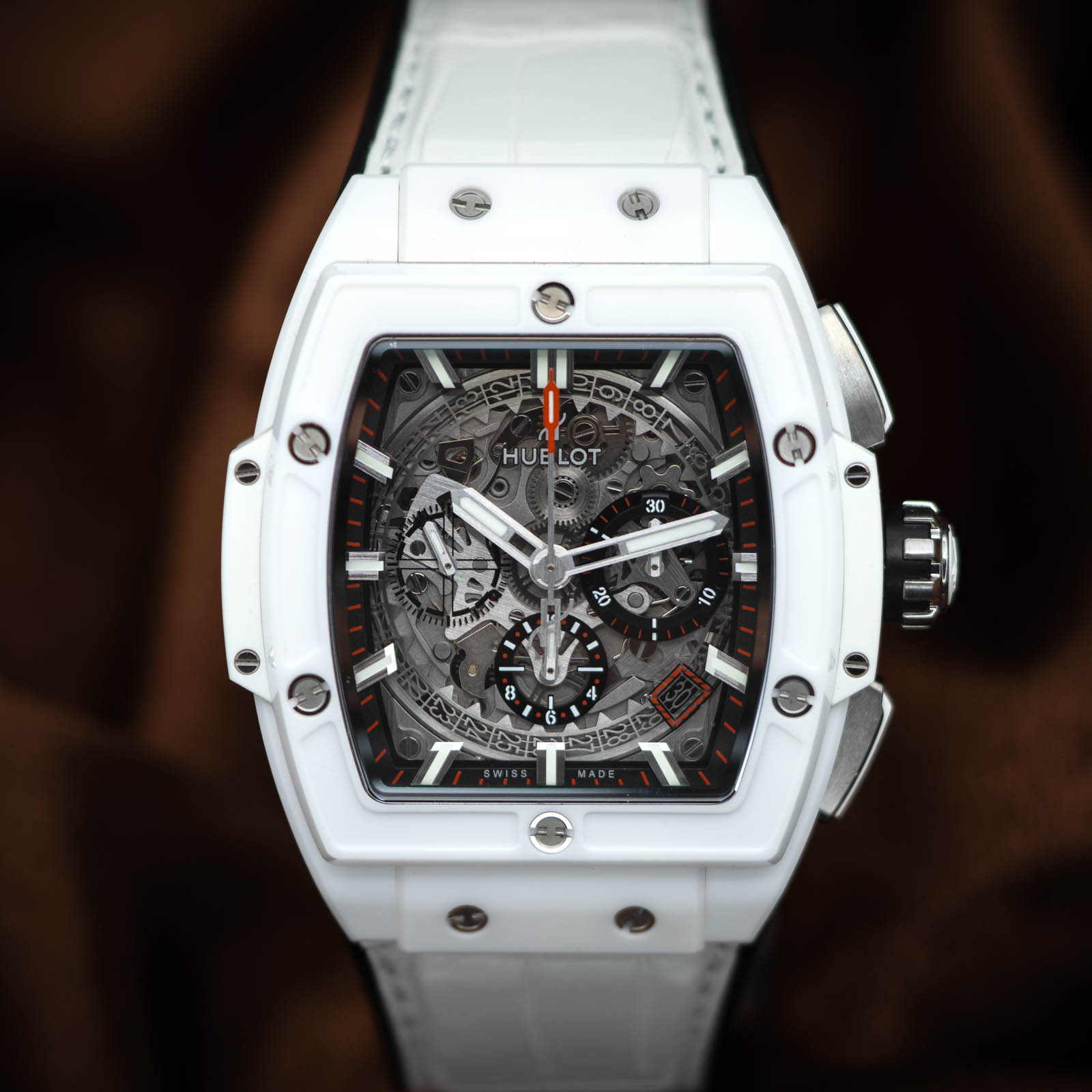 May be an image of wrist watch and text