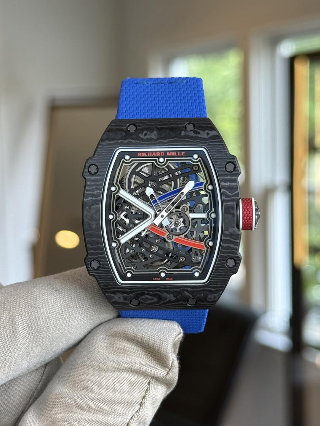May be an image of wrist watch and text